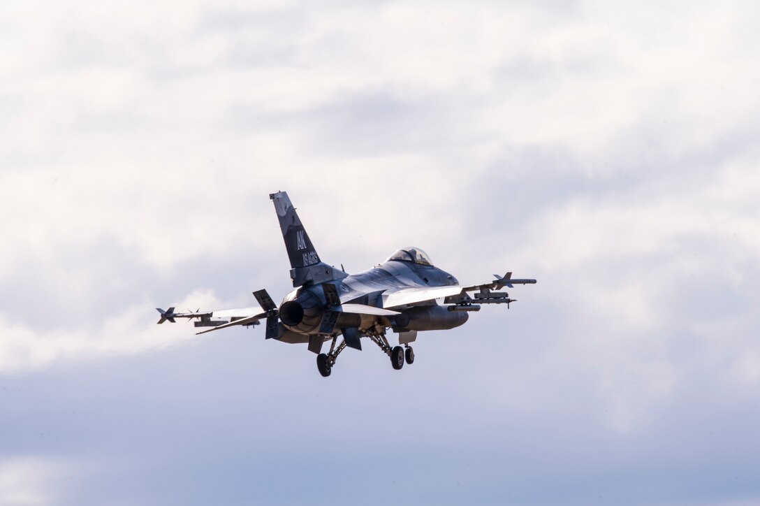 A U.S. Air Force F-16 Fighting Falcon assigned to the 18th Aggressor Squadron, prepares to land on Eielson Air Force Base, Alaska, May 11, 2015, during RED FLAG-Alaska (RF-A) 15-2. RF-A is a series of Pacific Air Forces commander-directed field training exercises for U.S. and partner nation forces, providing combined offensive counter-air, interdiction, close air support and large force employment training in a simulated combat environment. (U.S. Air Force photo by Staff Sgt. Joshua Turner/Released)