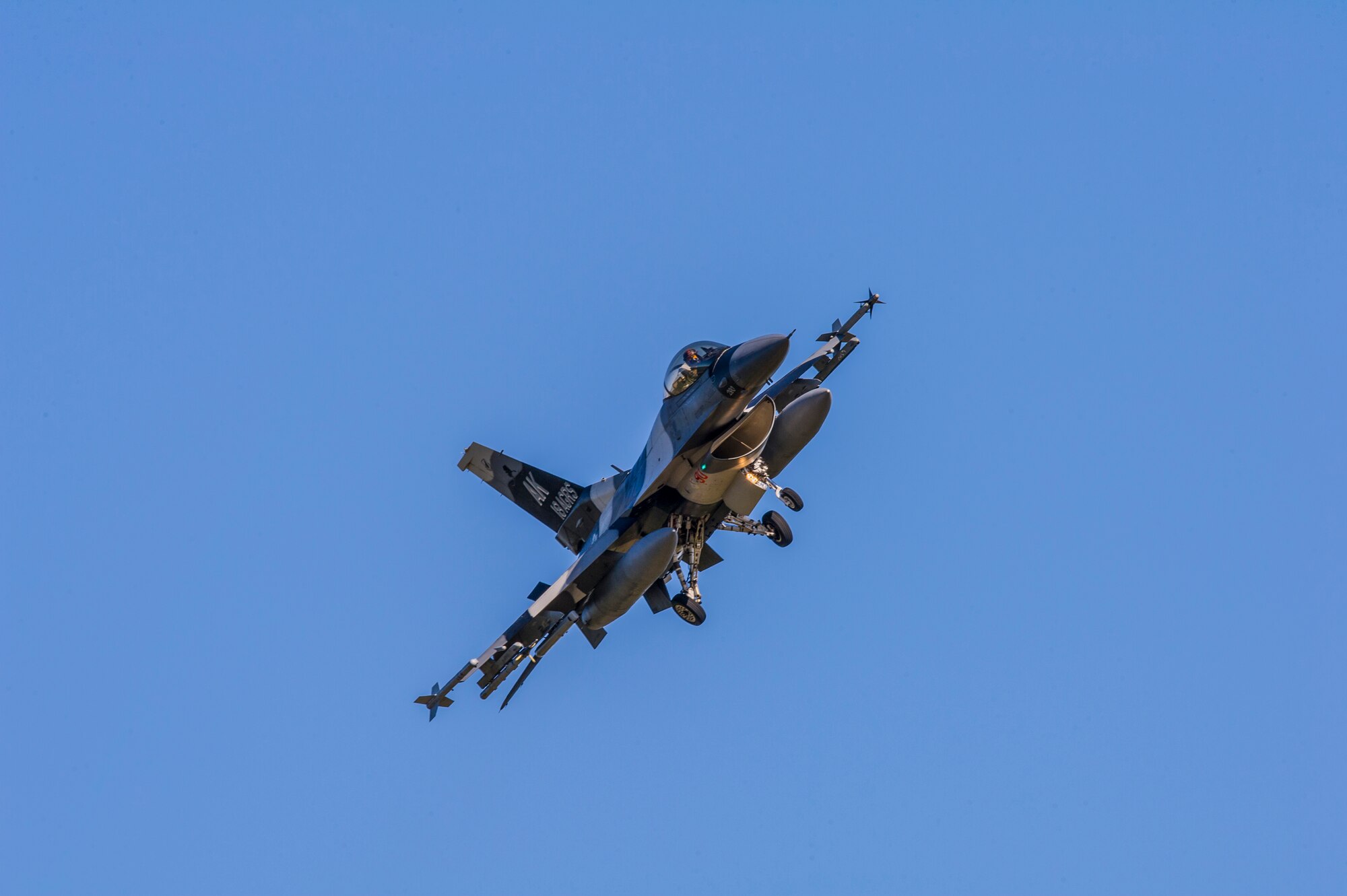 A U.S. Air Force F-16 Fighting Falcon assigned to the 18th Aggressor Squadron, prepares to land on Eielson Air Force Base, Alaska, May 11, 2015, during RED FLAG-Alaska (RF-A) 15-2. RF-A is a series of Pacific Air Forces commander-directed field training exercises for U.S. and partner nation forces, providing combined offensive counter-air, interdiction, close air support and large force employment training in a simulated combat environment. (U.S. Air Force photo by Staff Sgt. Joshua Turner/Released)