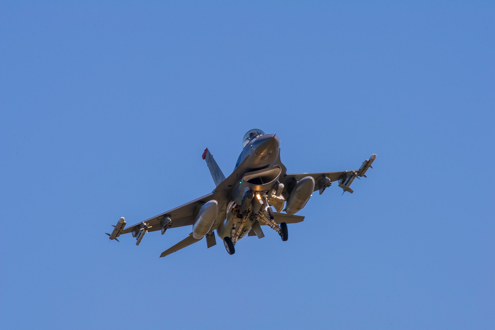 A U.S. Air Force F-16 Fighting Falcon assigned to the 13th Fighter Squadron, Misawa Air Base, Japan, prepares to land on Eielson Air Force Base, Alaska, May 11, 2015, during RED FLAG-Alaska (RF-A) 15-2. RF-A is a series of Pacific Air Forces commander-directed field training exercises for U.S. and partner nation forces, providing combined offensive counter-air, interdiction, close air support and large force employment training in a simulated combat environment. (U.S. Air Force photo by Staff Sgt. Joshua Turner/Released)