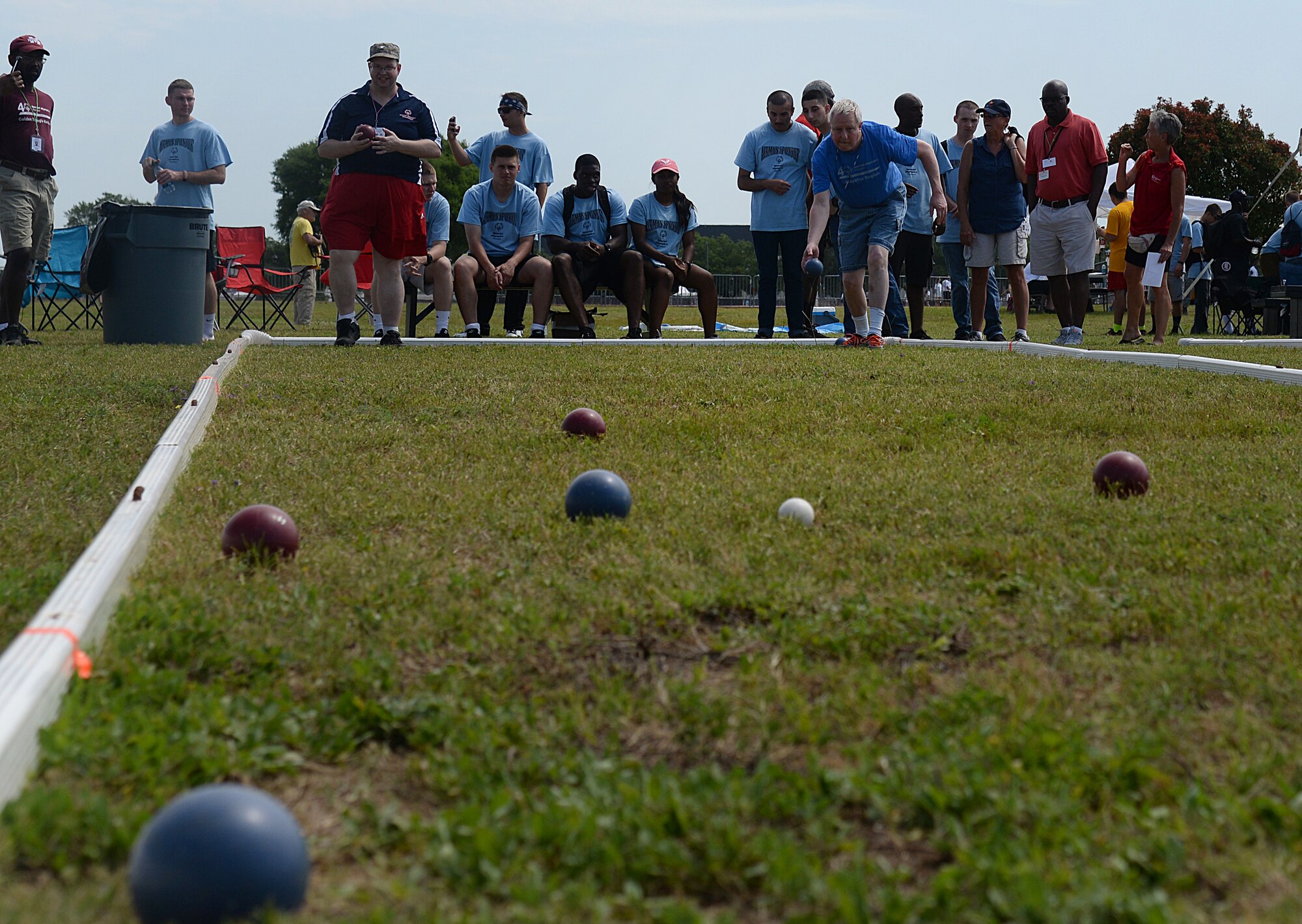 Two athletes compete in the bocce ball competition at the 2015 Mississippi State Special Olympics, May 9, 2015, Keesler Air Force Base, Miss. Approximately 752 athletes competed in 55 sports, ranging from aquatics to track and field events throughout the two day event. More than 2,500 Airmen and civilian volunteers and 266 coaches helped make the event a success. This year was the 29th year Keesler has hosted the event. (U.S. Air Force photo by Senior Airman Holly Mansfield)