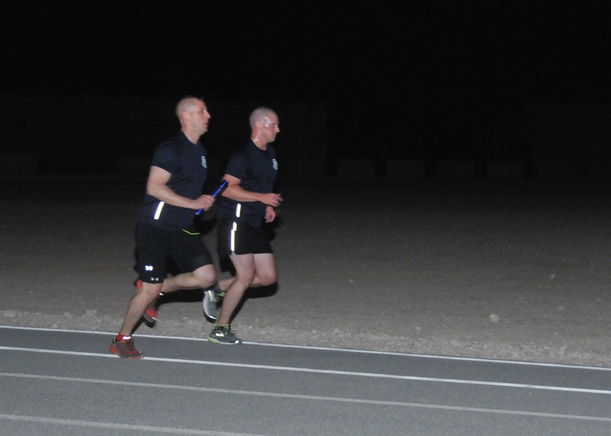 Personnel from the Air Force Office of Special Investigations’ 24th Expeditionary Field Investigations Squadron and Detachment 241, Al Udeid Air Base, Qatar, completed an 80-kilometer Memorial Relay Run in honor of AFOSI's Fallen Heroes from Operation Iraqi Freedom and Operation Enduring Freedom (Afghanistan).
Cumulatively, 17 participants covered the distance of slightly more than 51 miles in approximately seven hours and 10 minutes, April 26-27, 2015.