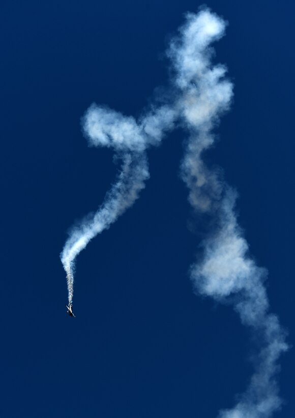 Adam Baker of Playful Airshows does an aerial demonstration during the Dyess Big Country Airfest May 2, 2015, at Dyess Air Force Base, Texas.  Other civilian acts, such as Jason Newburg of Viper Airshows and Andrew Wright of Carbon Fiber Airshows, performed during the show, too. (U.S. Air Force photo by Senior Airman Peter Thompson/ Released)
