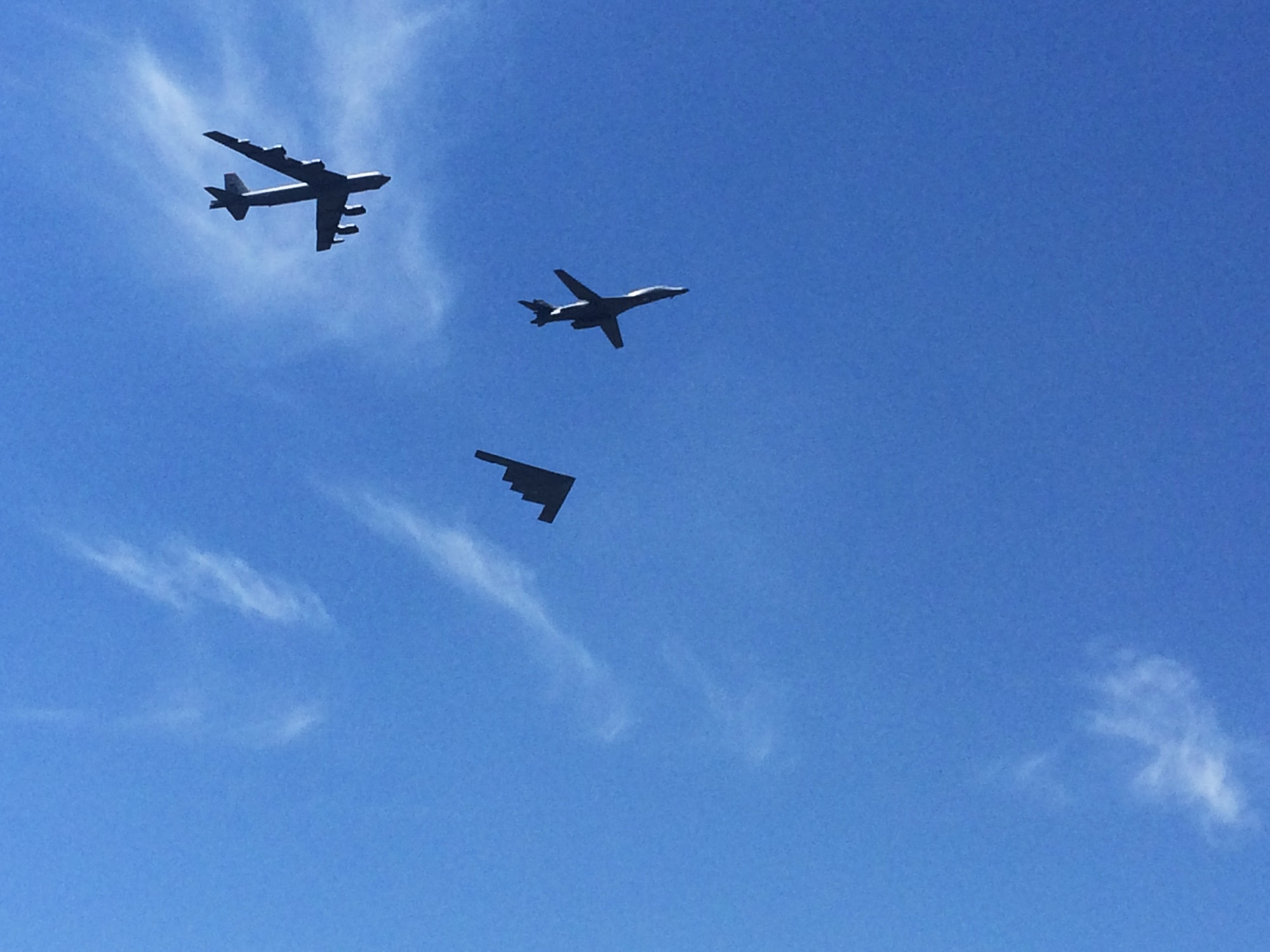 A Dyess B-1B Lancer flies in a formation with a B-52H Stratoforstress and a B-2 Spirit during the Dyess Big Country Airfest May 3, 2015, at Dyess Air Force Base, Texas. Not only did this three-ship formation celebrate the 7th Bomb Wing’s transition to Air Force Global Strike Command later this year, but  it also displayed the different aircraft of the bomber platform.  (U.S. Air Force photo by Airman 1st Class Autumn Velez/Released)