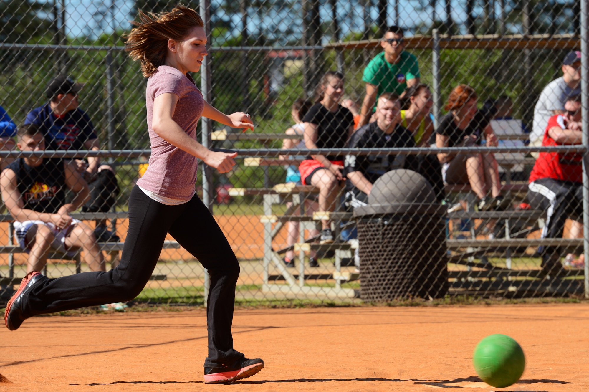 A Team Shaw spouse attempts to kick a ball during a “Big A” Day kickball game at Shaw Air Force Base, S.C., May 8, 2015. The “Big A” Day featured food, games, and sports for Airmen and their families to participate in to say “good-bye” to Chief Master Sgt. Charles Mills, 20th Fighter Wing command chief, before his permanent change of station. (U.S. Air Force photo by Senior Airman Jonathan Bass/Released)