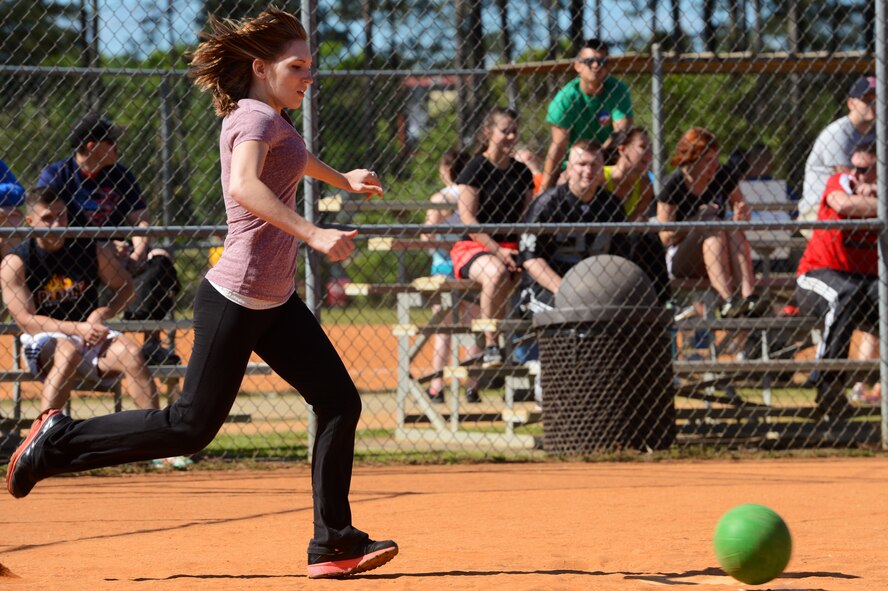 A Team Shaw spouse attempts to kick a ball during a “Big A” Day kickball game at Shaw Air Force Base, S.C., May 8, 2015. The “Big A” Day featured food, games, and sports for Airmen and their families to participate in to say “good-bye” to Chief Master Sgt. Charles Mills, 20th Fighter Wing command chief, before his permanent change of station. (U.S. Air Force photo by Senior Airman Jonathan Bass/Released)