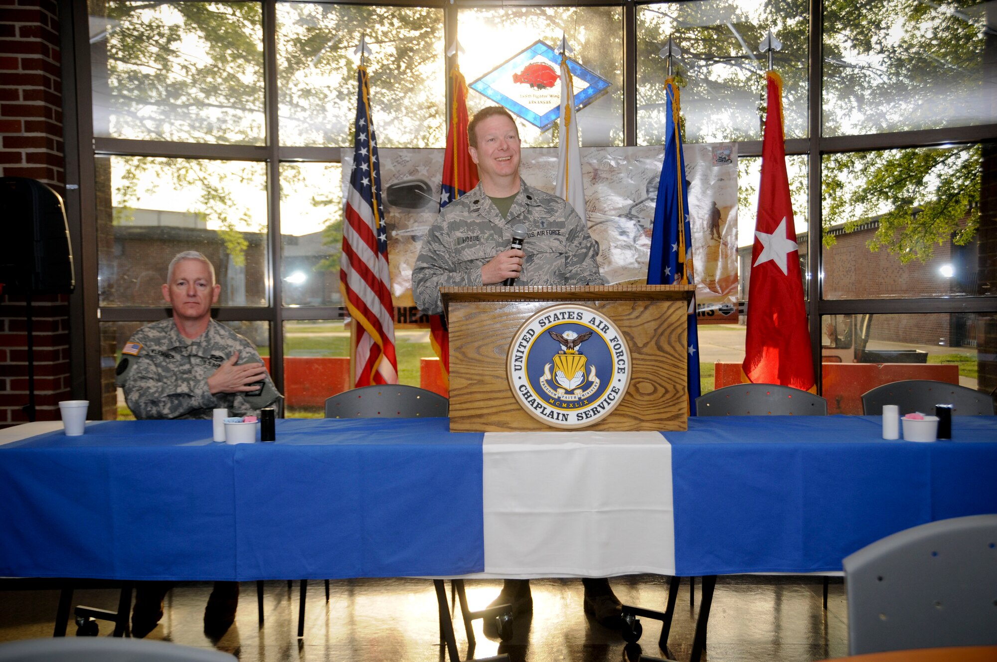 Maj. Herb Hodde, 188th Wing chaplain, speaks during the prayer breakfast held May 3, 2015 at Ebbing Air National Guard Base, Fort Smith, Ark. The breakfast was hosted by the 188th Chaplain's Office to support the Airmen in their spiritual beliefs. (U.S. Air National Guard photo by Senior Airman Cody Martin/released)