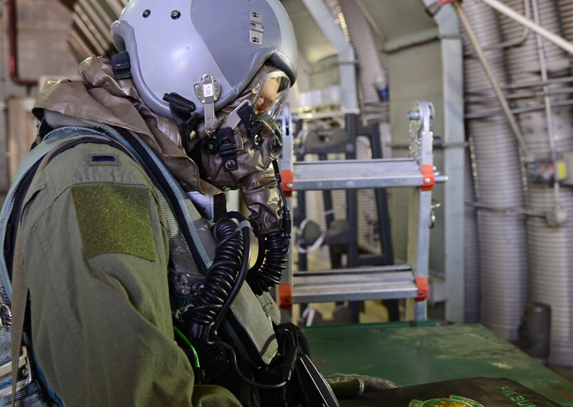 1st Lt. Matthew Barrett, 25th Fighter Squadron pilot, pauses during the making of a training video May 4, 2015, at Osan Air Base, Republic of Korea. Barrett assisted with the video in preparation for exercise Beverly Midnight 15-02 which is designed to test American forces in the ROK on their mission readiness in the event of an emergency or wartime environment. (U.S. Air Force photo by Staff Sgt. Benjamin Sutton/Released)