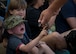 The 6th Ranger Training Battalion’s resident snake handlers let the crowd pet the non-venomous snakes during the reptile demonstration at the Rangers’ Open House event May 9 at Eglin Air Force Base, Fla. The event was a chance for the public to learn how Rangers train and operate. The event displays showed equipment, weapons, a reptile zoo, face painting and weapon firing among others. The demonstrations showed off hand-to-hand combat, a parachute jump, snake show, and Rangers in action. (U.S. Air Force photo/Tech. Sgt. Jasmin Taylor)