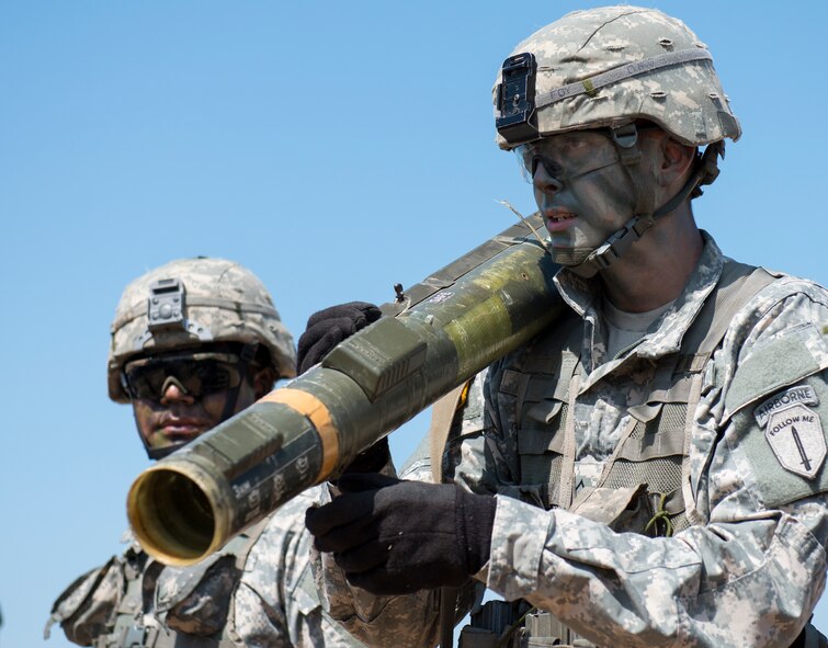 The heavy gunner and his partner prepare to engage a target during a demonstration at the 6th Ranger Training Battalion’s Open House event May 9 at Eglin Air Force Base, Fla. The event was a chance for the public to learn how Rangers train and operate. The event displays showed equipment, weapons, a reptile zoo, face painting and weapon firing among others. The demonstrations showed off hand-to-hand combat, a parachute jump, snake show, and Rangers in action. (U.S. Air Force photo/Tech. Sgt. Jasmin Taylor)