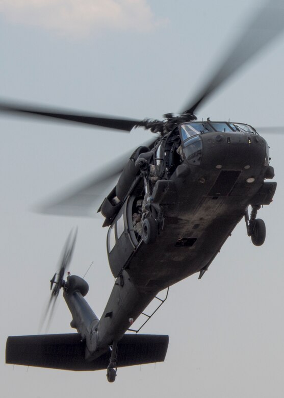 A UH-60 Black Hawk prepares to land during a demonstration at the Rangers’ Open House event May 9 at Eglin Air Force Base, Fla. The event was a chance for the public to learn how Rangers train and operate. The event displays showed equipment, weapons, a reptile zoo, face painting and weapon firing among others. The demonstrations showed off hand-to-hand combat, a parachute jump, snake show, and Rangers in action. (U.S. Air Force photo/Tech. Sgt. Jasmin Taylor)