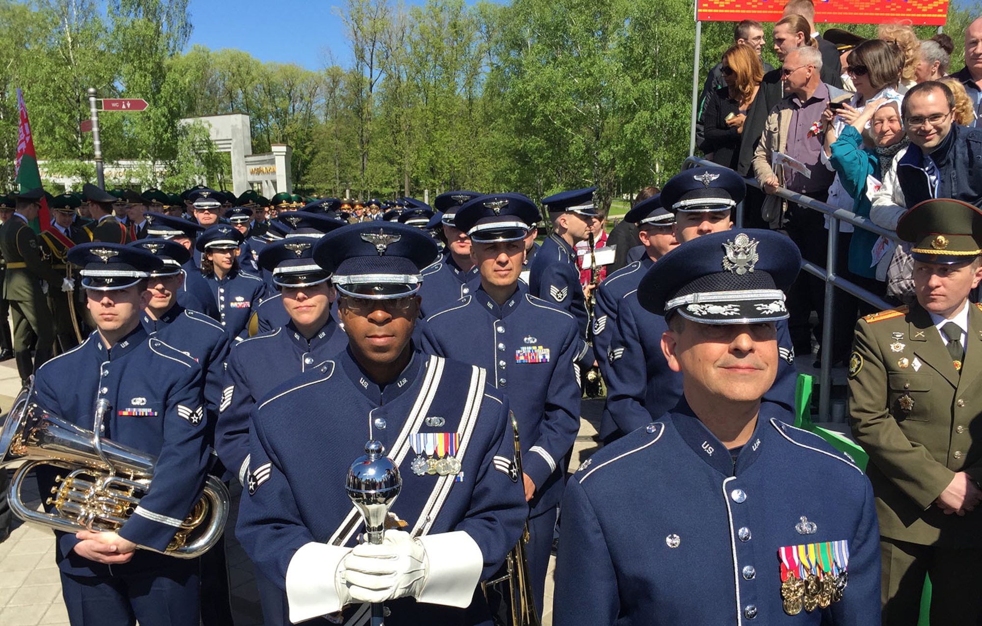 MINSK, BELARUS -- Led by U.S. Air Force Lt. Col. Mike Mench, U.S. Air Forces 
in Europe Band commander, and Staff Sgt. Chris Jackson, USAFE Band drum major, 
the USAFE Band gather at a staging point before marching in the World War II 
Victory Day Parade May 9, 2015, in Minsk, Belarus. The band's participation 
was the first time in Belarus' history that participants from the U.S. 
Department of Defense marched in the parade to commemorate the sacrifices of 
the World War II Allies and the end of hostilities 70 years ago. In addition 
to their participation in the Victory Day parade, which included more than 
5,000 Belarussian soldiers and 250 military vehicles, the 34 USAFE bandsmen 
performed concerts in Brest and Minsk, Belarus. (U.S. Air Force photo by 
Master Sgt. Brian Bahret)

