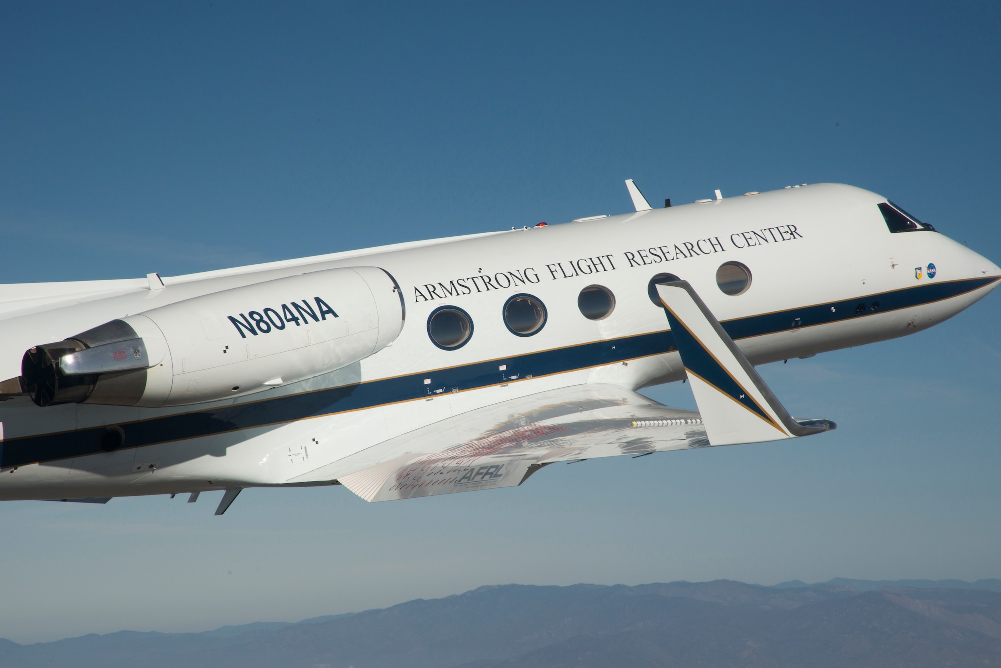 The modified Gulfstream III flight research aircraft with an adaptive compliant wing trailing edge is shown with 25 degrees of trailing edge deflection. (Courtesy photo)