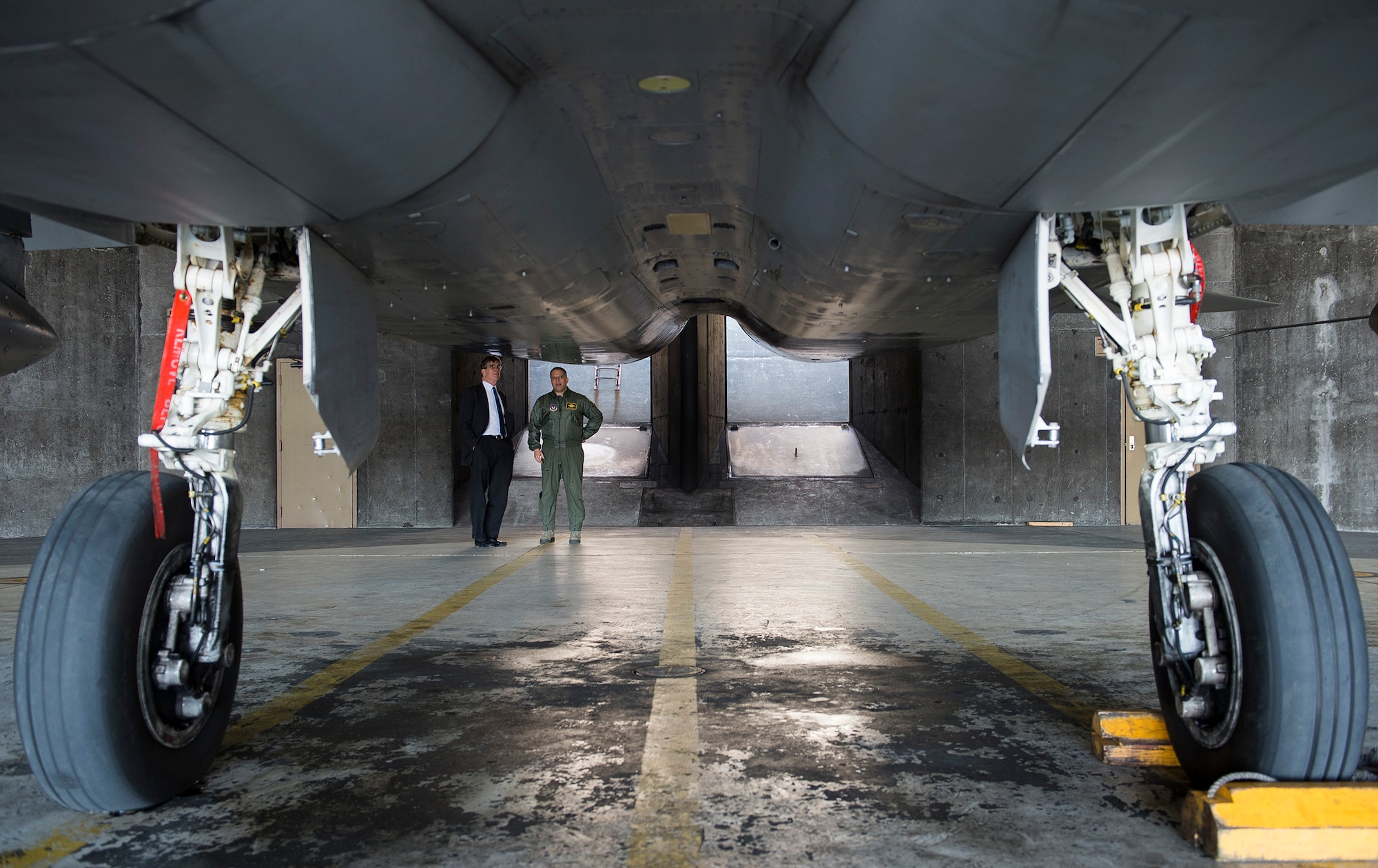 U.S. Air Force Lt. Col. Mark Sadler, 871st Air Expeditionary Squadron commander, gives Ambassador Robert Barber, U.S. Ambassador to Iceland, a tour of an F-15C Eagle fighter aircraft during a visit to Keflavik International Airport, Iceland, May 4, 2015. Four F-15C aircraft and one KC-135 Stratotanker aircraft are deployed here in support of Icelandic Air Surveillance and Policing 2015, a NATO operation designed to secure Iceland’s airspace. (U.S. Air Force photo by Staff Sgt. Chad Warren/Released)