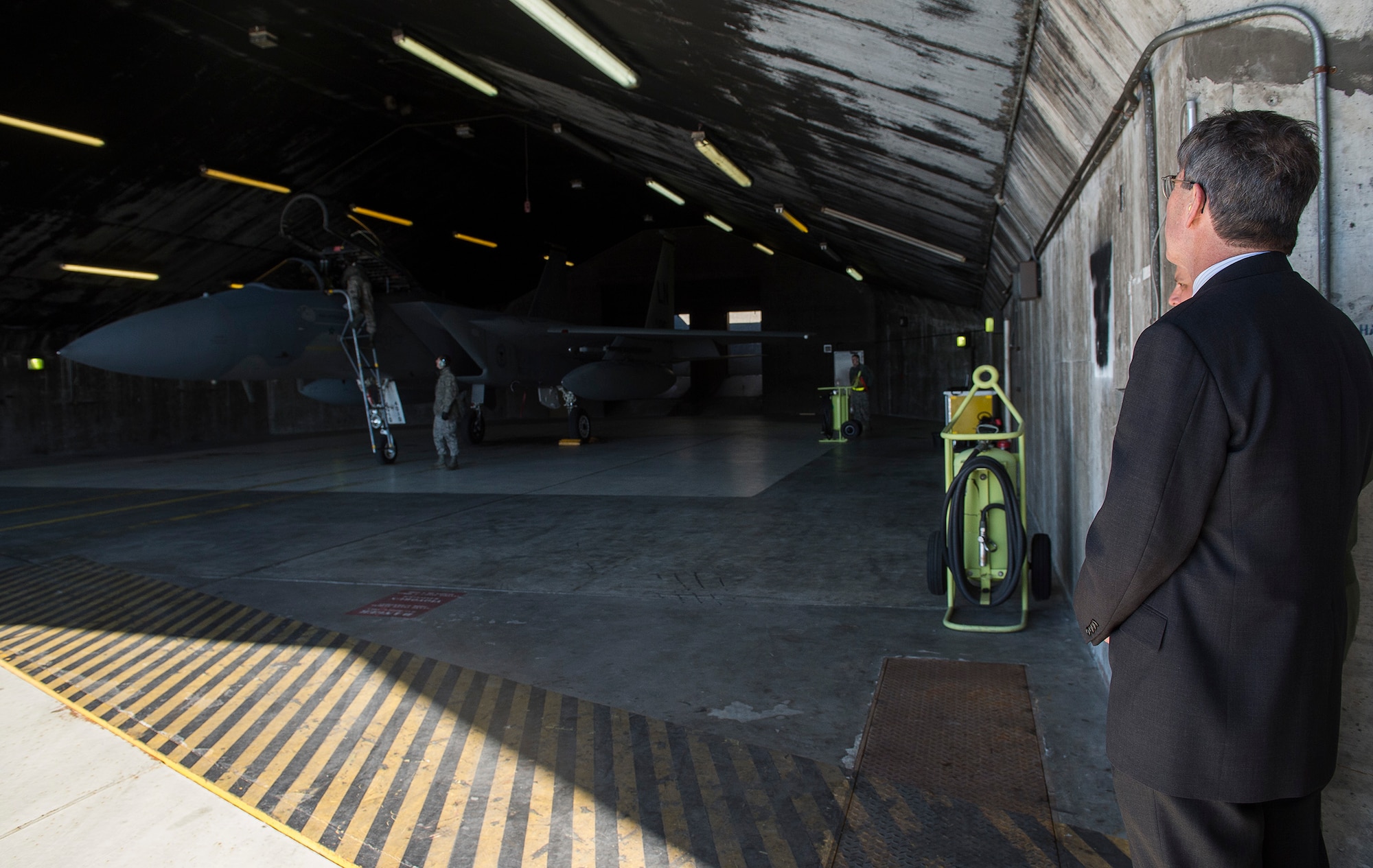 Ambassador Robert Barber, U.S. Ambassador to Iceland, watches a training scramble of an F-15C Eagle fighter aircraft during a visit to Keflavik International Airport, Iceland, May 4, 2015. Four F-15C aircraft and one KC-135 Stratotanker aircraft are deployed here in support of Icelandic Air Surveillance and Policing 2015, a NATO operation designed to secure Iceland’s airspace. (U.S. Air Force photo by Staff Sgt. Chad Warren/Released)