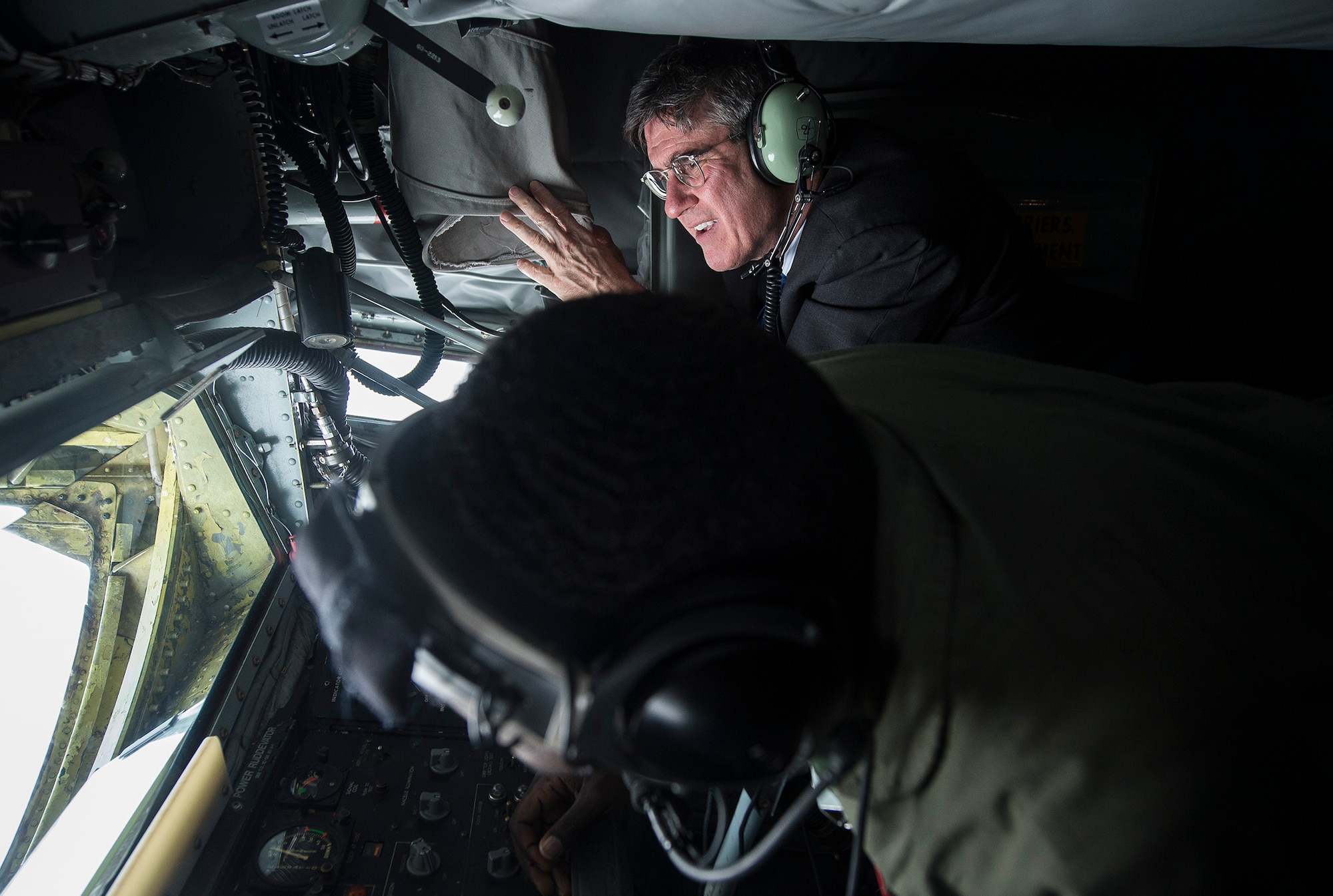Ambassador Robert Barber, U.S. Ambassador to Iceland, observes an aerial refuel operation in a KC-135 Stratotanker aircraft during a visit to Keflavik International Airport, Iceland, May 4, 2015. Barber visited Keflavik to meet with troops deployed in support of Icelandic Air Surveillance and Policing 2015, an ongoing NATO mission designed to secure Iceland’s airspace. (U.S. Air Force photo by Staff Sgt. Chad Warren/Released)