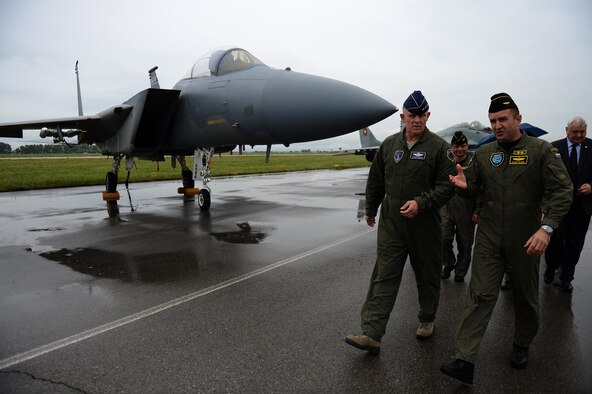 U.S. Air Force Gen. Frank Gorenc, U.S. Air Forces in Europe and Air Forces Africa commander, left, walks with Maj. Gen. Rumen Radev, Bulgarian Air Force commander during a visit to Graf Ignatievo Air Base, Bulgaria, May 11, 2015. Airmen and F-15 Eagles from the 159th Expeditionary Fighter Squadron are part of Europe's first-ever Theater Security Package deployment. The European TSP provides the opportunity for U.S. forces to train with NATO allies and is enabled by the strategic access provided by the infrastructure, support and host-nation relationships at U.S. and host-nation installations. (U.S. Air Force photo by Senior Airman Gustavo Castillo/Released) 