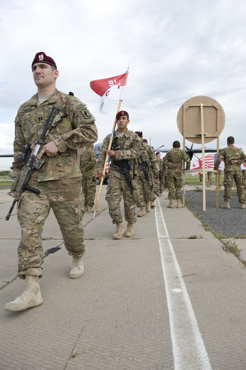 American paratroopers from Troop C, 1st Squadron, 91st Cavalry Regiment 173rd Airborne Brigade arrive at Joint Aviation Base Tbilisi, Republic of Georgia, May 8, 2015. The paratroopers were welcomed by Republic of Georgia soldiers during a small ceremony. The paratroopers arrived from Grafenwoehr, Germany, to train alongside other U.S. soldiers from Company A, 2nd Battalion, 7th Infantry Regiment, 1st Brigade, 3rd Infantry Division, and Georgian Land Forces troops in Exercise Noble Partner. U.S. Army photo by Sgt. Daniel Cole