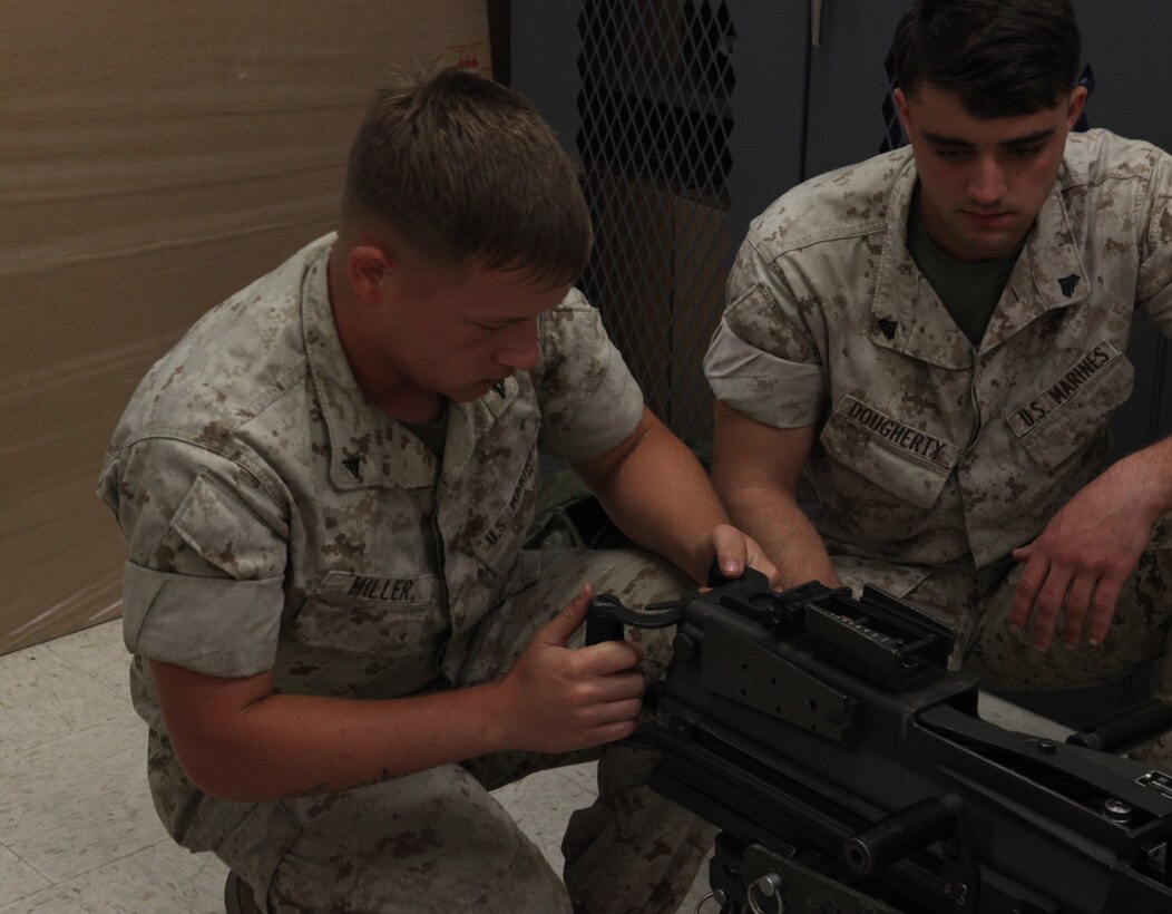 Lance Cpl. Zachary Miller, a motor vehicle operator with 2nd Light Armored Reconnaissance Battalion, 2nd Marine Division function checks a Mk-19 automatic grenade launcher during a Machine Gunners Course at the Division Combat Skills Center aboard Camp Lejeune, N.C., April 15, 2015. During the course the Marines were trained how to properly disassemble, reassemble and maintain the M249 squad automatic weapon, the M240B machine gun, Browning M2 .50 caliber machine gun and the MK19 automatic grenade launcher. (U.S. Marine Corps photo by Pfc. David N. Hersey/Released)