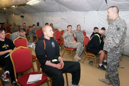 Staff Sgt. Michael Zanin goes over different ways to deal with stress with guard force members during Master Resilience training at Camp Sabalu-Harrison, Parwan, Afghanistan. 