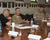 U.S. Marine Corps, Commandant of the Marine Corps (CMC), Gen. Joseph Dunford sits with the Marine Corps Warfighting Laboratory (MCWL) on Marine Corps Base Quantico, May 6, 2015. The CMC met with the Marines and the civilians of the command. (U.S. Marine Corps photo by Lance Cpl. Jacqueline A. Garcia/ Released) 