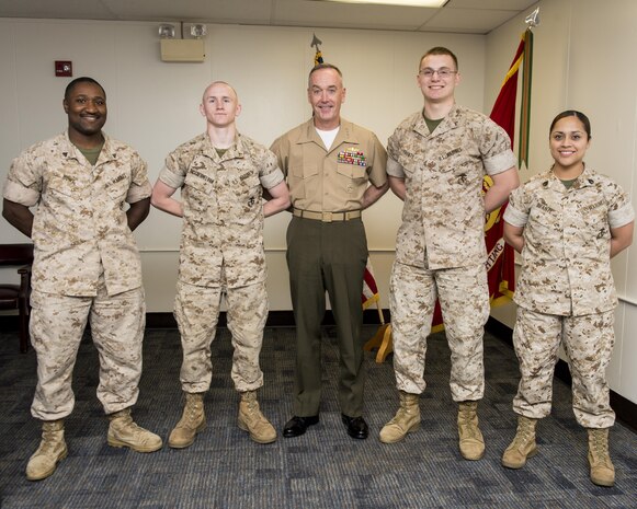 U.S. Marine Corps, Commandant of the Marine Corps (CMC), Gen. Joseph Dunford sits with the Marine Corps Warfighting Laboratory (MCWL) on Marine Corps Base Quantico, May 6, 2015. The CMC met with the Marines and the civilians of the command. (U.S. Marine Corps photo by Lance Cpl. Jacqueline A. Garcia/ Released) 