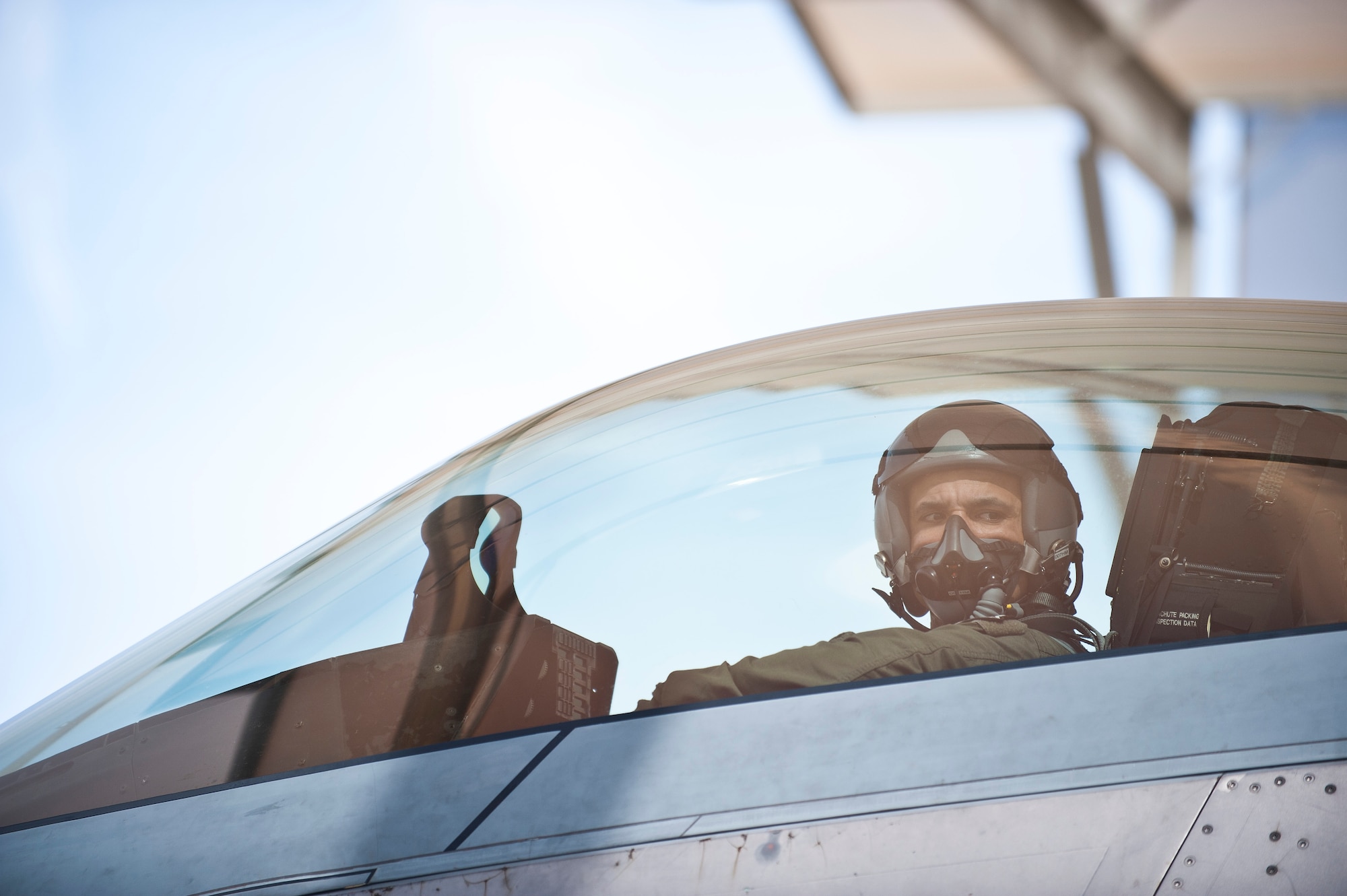 Col. Adrian Spain, U.S. Air Force Weapons School commandant, preps for his final flight as the USAFWS commandant at Nellis Air Force Base, Nev., May 11, 2015. Spain has served as the commandant of the USAFWS since June 2013. (U.S. Air Force photo by Staff Sgt. Siuta B. Ika)