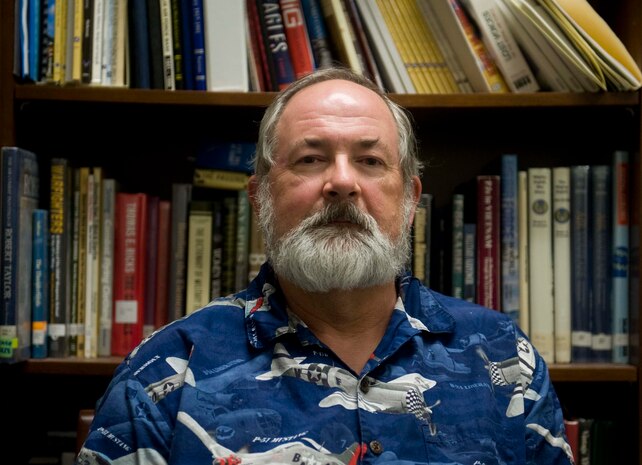 Gerald White, 99th Air Base Wing historian, poses for a photo at Nellis Air Force Base Nev., May 1, 2015. White retired from the Air Force in 2003 with 28 years of service and has since been a historian dedicated to preserving the Air Force’s heritage.(U.S. Air Force photo by Airman 1st Class Rachel Loftis)  