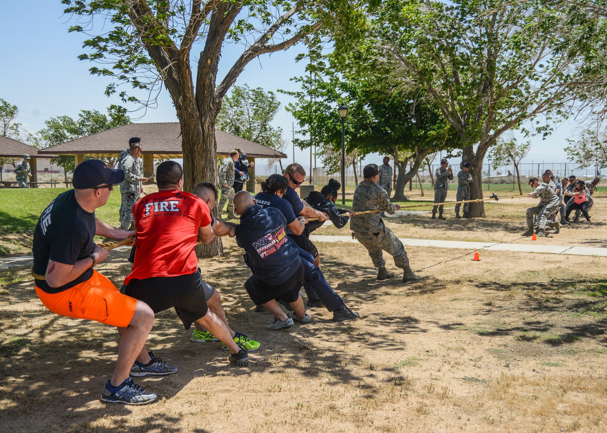 The 412th Security Forces Squadron takes on the Fire Department in tug-o-war during a First Responders Cookout May 7 at Arnold Park. The barbecue was held in honor of National Police Week. (U.S. Air Force photo by Rebecca Amber.)