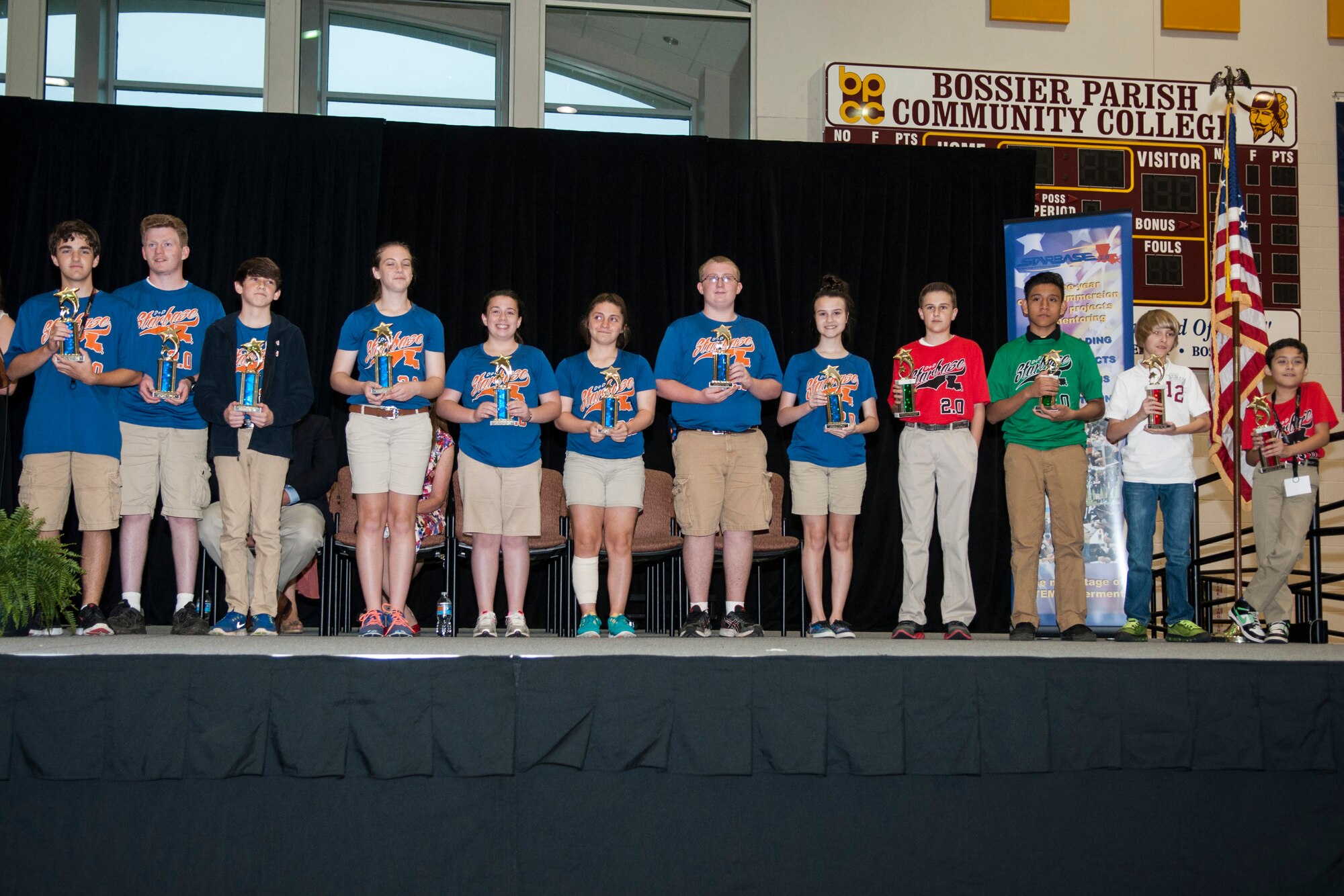 STARBASE outstanding performers are presented certificates and trophies during the End of Year Celebration and Awards Presentation ceremony, May 11, 2015, Bossier City, La. The STARBASE vision is to raise the interest and improve the knowledge and skills of at-risk youth in science, technology, engineering, and mathematics, to provide for a highly-educated and skilled American workforce to meet the advanced technological requirements of the Department of Defense. (U.S. Air Force photo by Master Sgt. Dachelle Melville/Released)