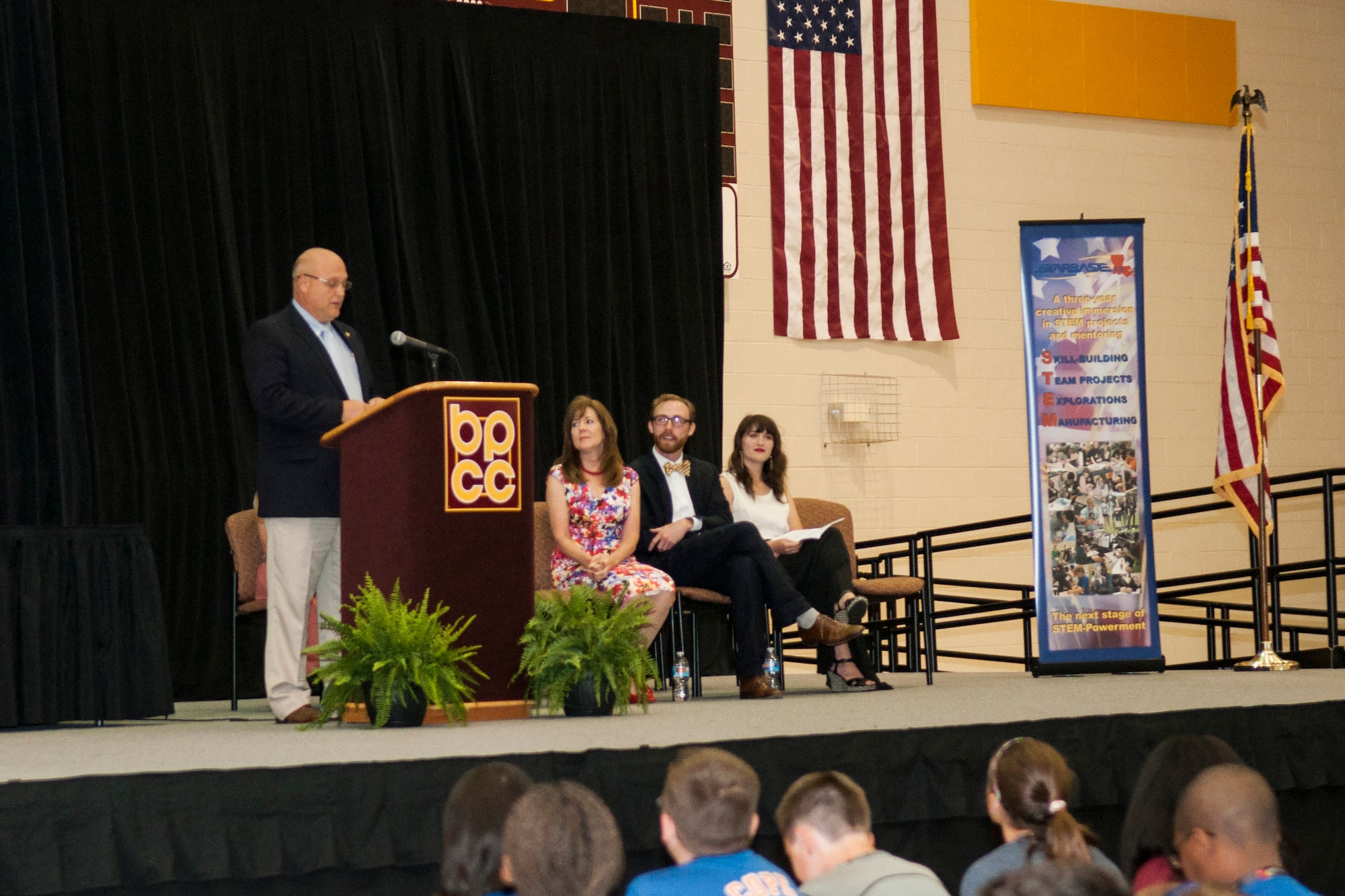 Retired U. S. Air Force Col. West Anderson speaks as the guest speaker at the STARBASE 2.0 End of Year Celebration and Awards Ceremony. Anderson is the Director of the Boeing Barksdale Field Office. Over 130 students from three area middle schools were awarded participation and project awards in front of their families in Bossier City, La. on May 11, 2015. (U.S. Air Force photo by Master Sgt. Dachelle Melville/Released)