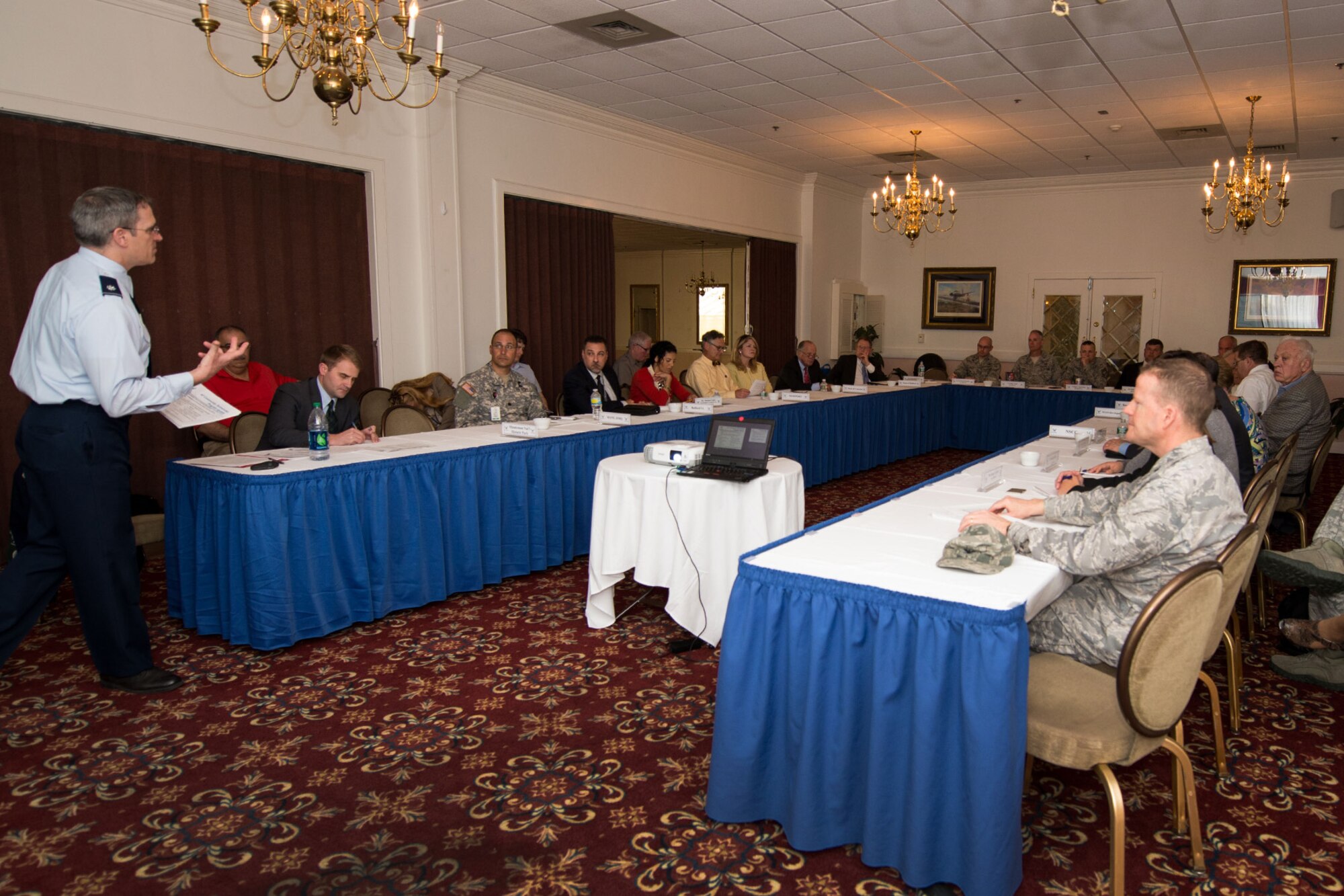Base and community leaders listen to opening remarks from Lt. Col. Dave Skiba, Partnership Broker, AF Community Partnership Initiative, during the quarterly Community Partnership Initiative meeting at Hanscom Air Force Base, Mass., May 12, 2015. The Community Partnership Initiative is a forum for base leaders and local communities to discuss potential shared-service arrangements. (U.S. Air Force photo by Mark Herlihy)
