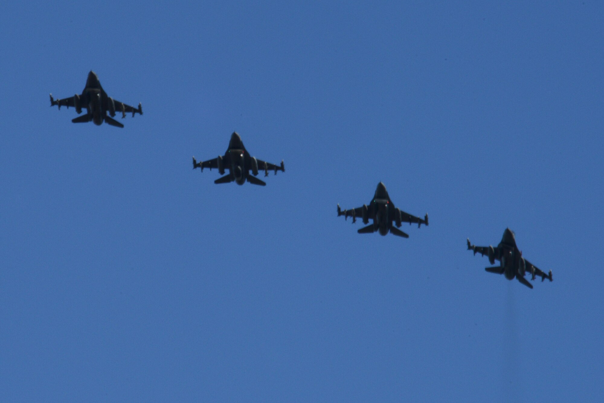 U.S. Air Force F-16 Fighting Falcons assigned to the 13th Fighter Squadron, Misawa Air Base, Japan, prepares to land May 11, 2015, after a sortie during RED FLAG-Alaska (RF-A) 15-2 at Eielson Air Force Base, Alaska. The two-week long exercise takes place within the Joint Pacific Alaska Range Complex, a 67,000 square-mile training range. (U.S. Air Force photo by Senior Airman Ashley Nicole Taylor/Released)

