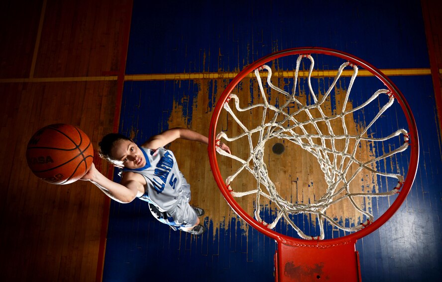 U.S. Air Force 2nd Lt. Micah Wessinger, 20th Logistics Readiness Squadron installation deployment officer, goes up for a layup at the Shaw Air Force Base, S.C., fitness center basketball court, April 24, 2015. Wessinger played on the United States Armed Forces Women’s Basketball Team in the Headquarter AirCom Inter-Nation Basketball Tournament held at Royal Air Force Lakenheath, England, March 24-27, 2015. (U.S. Air Force photo by Senior Airman Jensen Stidham/Released)