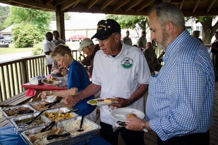 The 841st Transportation Battalion held a reunion for 23 former troops of the 1304th Major Port Command, May 8, 2015 at Joint Base Charleston – Weapons Station, S.C. The 841st TB was formally known as the 1304th MPC back in 1993. In 1997, the 1304th MPC became the 595th Transportation Group and then became the 841st TB in 1999. (U.S. Air Force photo/Staff Sgt. AJ Hyatt)