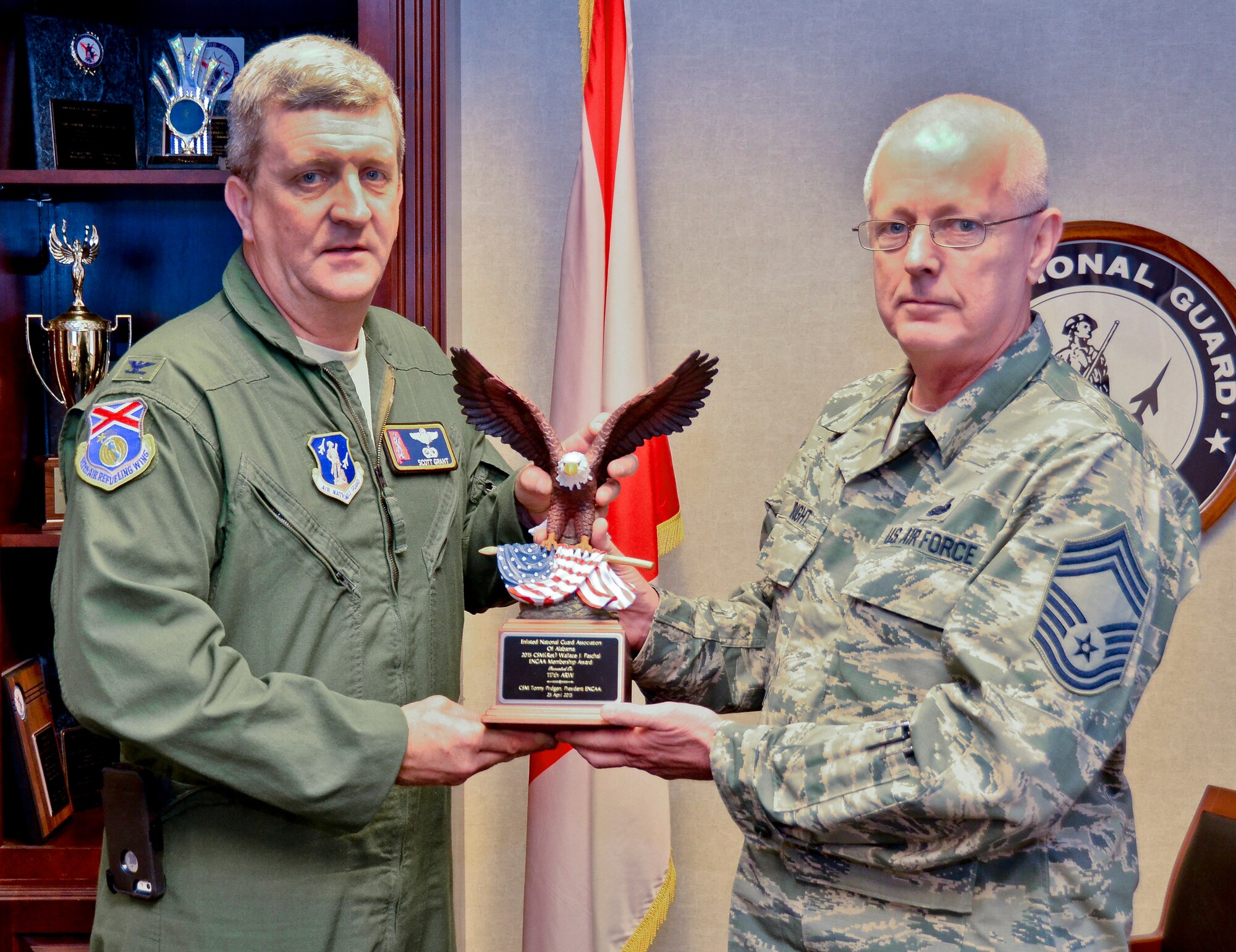 Col. Scott Grant, 117th Air Refueling Wing Vice Commander and Chief Master Sgt. David Wright Displays the CSM Wallace J Paschal Enlisted National Guard Association of Alabama Award for having more elisted members than any other unit in Alabama. The award was presented to the 117 ARW during a conference on April 25, 2015.  (U.S. Air National Guard photo by: Senior Master Sgt. Ken Johnson/Released)