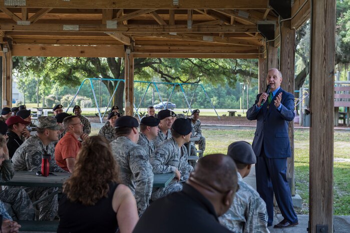 Sheriff of Charleston County, James Cannon Jr., speaks to a group of defenders from the 628th Security Forces Squadron May 11, 2015 at Joint Base Charleston, S.C. Cannon’s presentation  started the 2015 National Police Week celebration. Each year police week is held to honor those who have made the ultimate sacrifice in the line of duty. Cannon, a retired colonel from the Air Force Reserve, shared a few words of wisdom and offered his gratitude to the men and women who protect the installation as well as the many people who work and live on Joint Base Charleston. Events for this year’s police week include a picnic, a 24-hour ruck march and a retreat ceremony.  (U.S. Air Force photo/Senior Airman Jared Trimarchi) 
