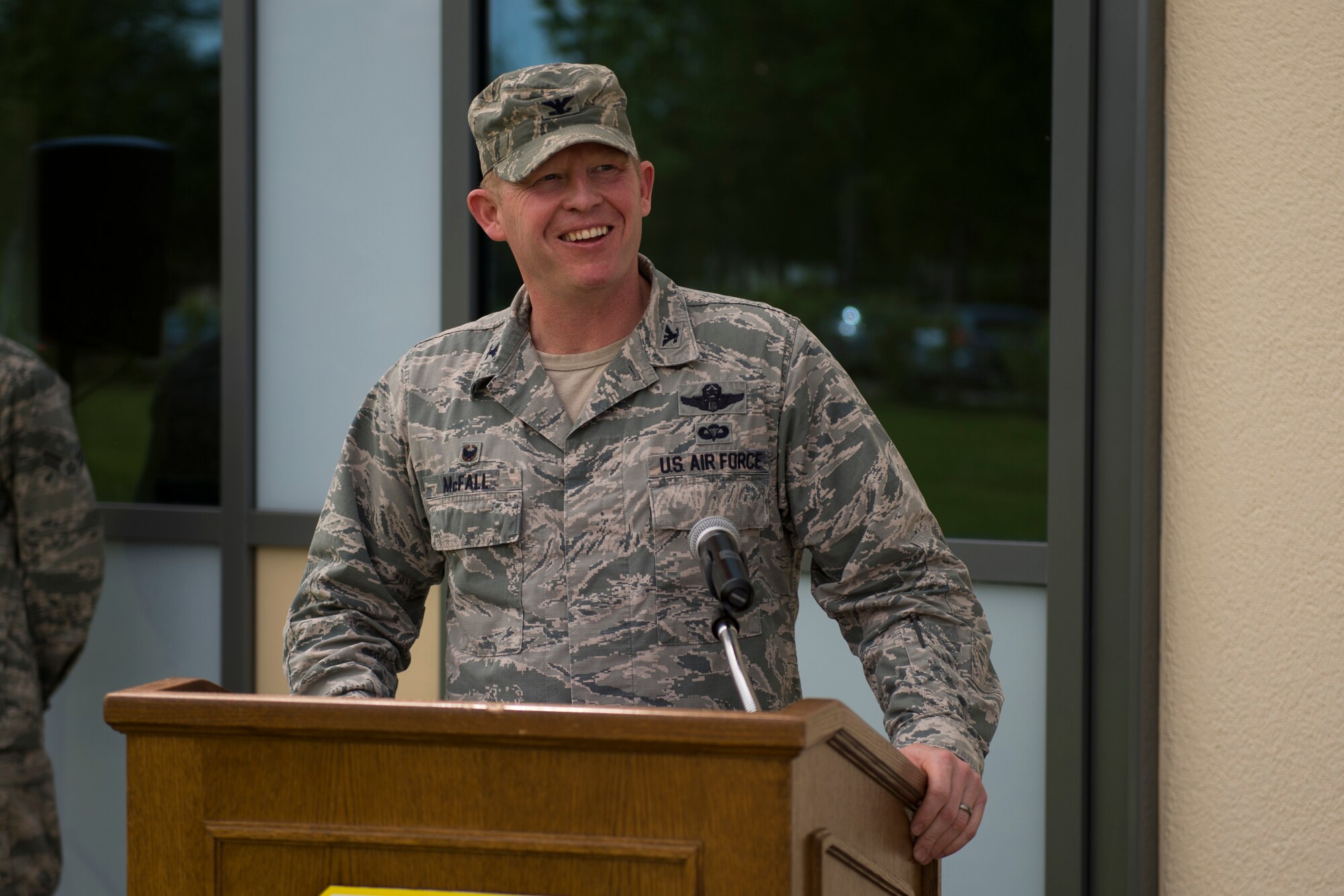 U.S. Air Force Col. Joe McFall, 52nd Fighter Wing commander, speaks during the official opening of the new child development center at Spangdahlem Air Base, Germany, May 11, 2015. McFall said the new facility is an important addition to the base and enhances quality of life for Saber families. (U.S. Air Force photo by Airman 1st Class Luke Kitterman/Released)