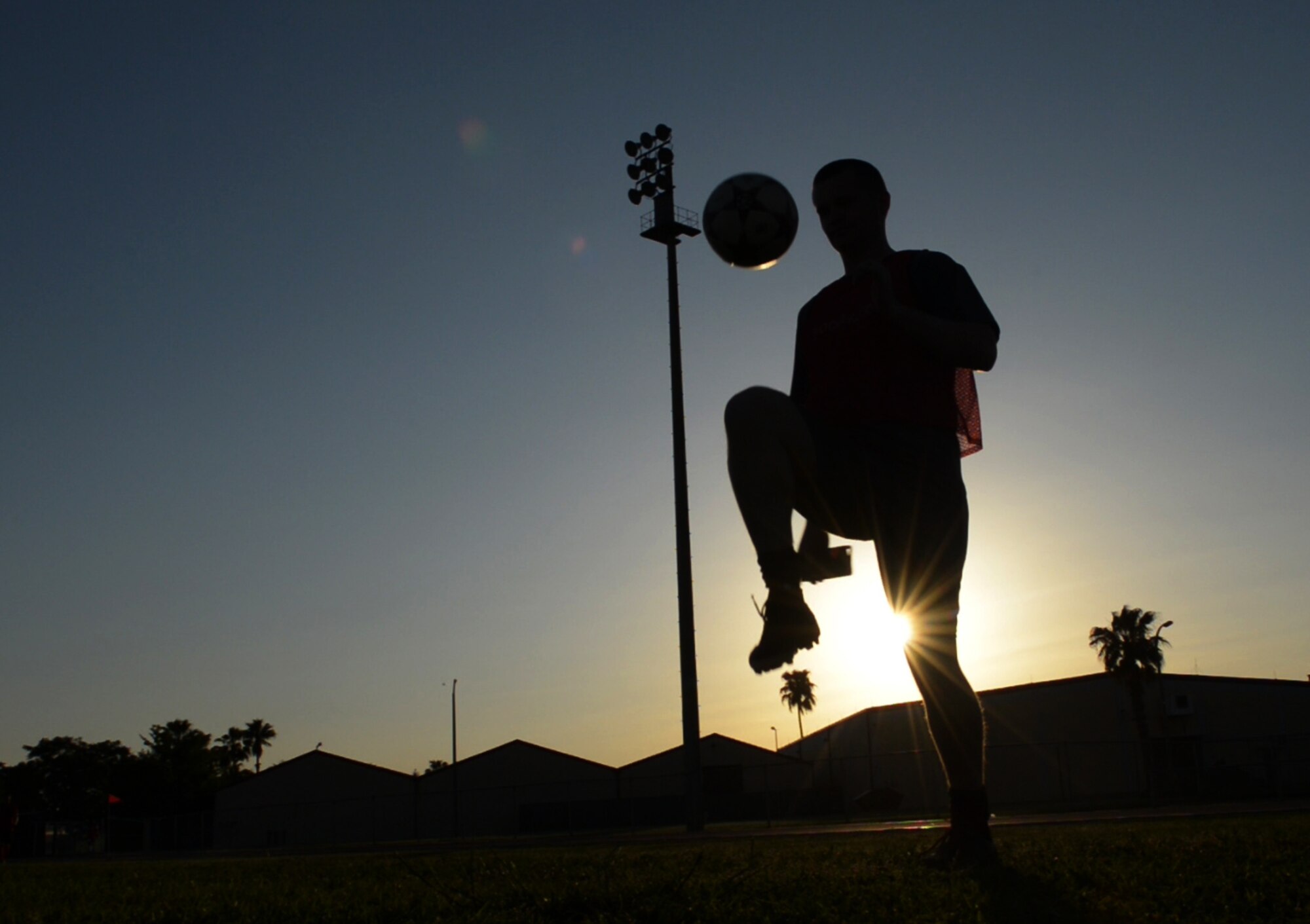 An Airman warms up before playing in a soccer game that served as a kick-off event to celebrate the Turkish and U.S. air forces working together in cooperation for more than 60 years May 7, 2015, at Incirlik Air Base, Turkey. The match aimed to enhance friendship between the different armed forces stationed at Incirlik AB. (U.S. Air Force photo by Senior Airman Krystal Ardrey/Released)
