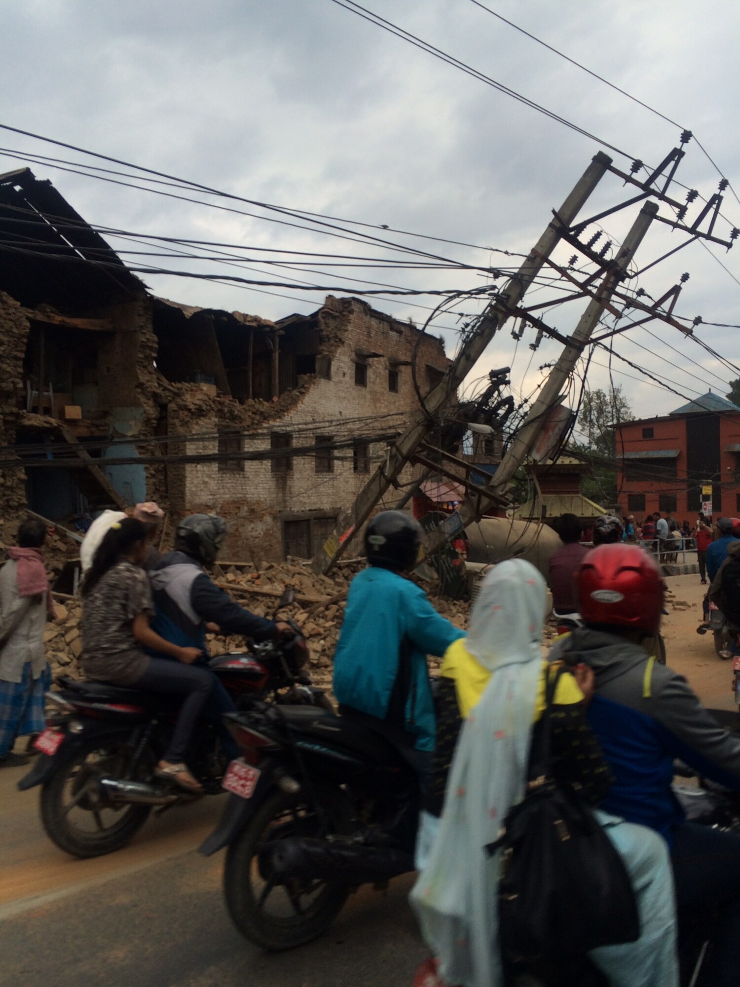 Residents travel down the streets of Kathmandu, Nepal following the 
devastating 7.8 magnitude earthquake that damaged many parts of the country. 
(Courtesy photo)
