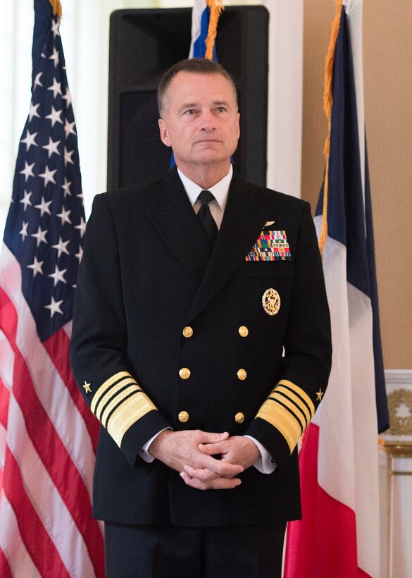 U.S. Navy Adm. James A. Winnefeld Jr., vice chairman of the Joint Chiefs of Staff, stands before receiving the French National Order of Merit, commander class, from French Ambassador to the U.S. Gerard Araud in Washington, D.C., May 11, 2015.
