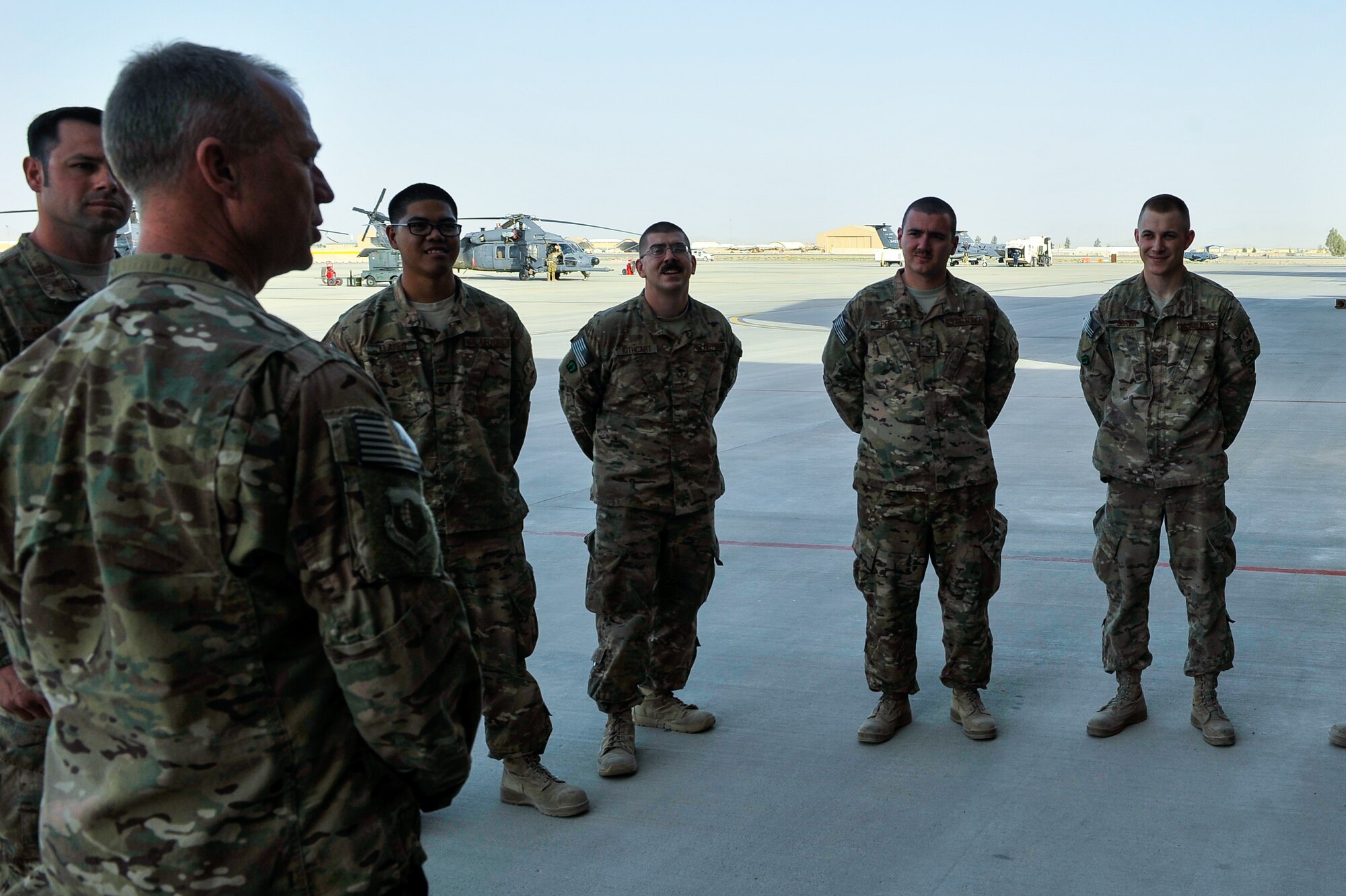 U.S. Air Force Brig. Gen. Mark D. Kelly, 455th Air Expeditionary Wing commander, talks with Airmen assigned to the 451st Air Expeditionary Group during a visit to Kandahar Airfield, Afghanistan, May 2, 2015.  The general along with Chief Master Sgt. Jeffery Brown, 455th AEW command chief, met with Airmen from across the group who provide intelligence, surveillance and reconnaissance, command and control, personnel recovery, and airborne datalink capabilities to commanders in the Afghanistan theater of operations. (U.S. Air Force photo by Maj. Tony Wickman/Released)