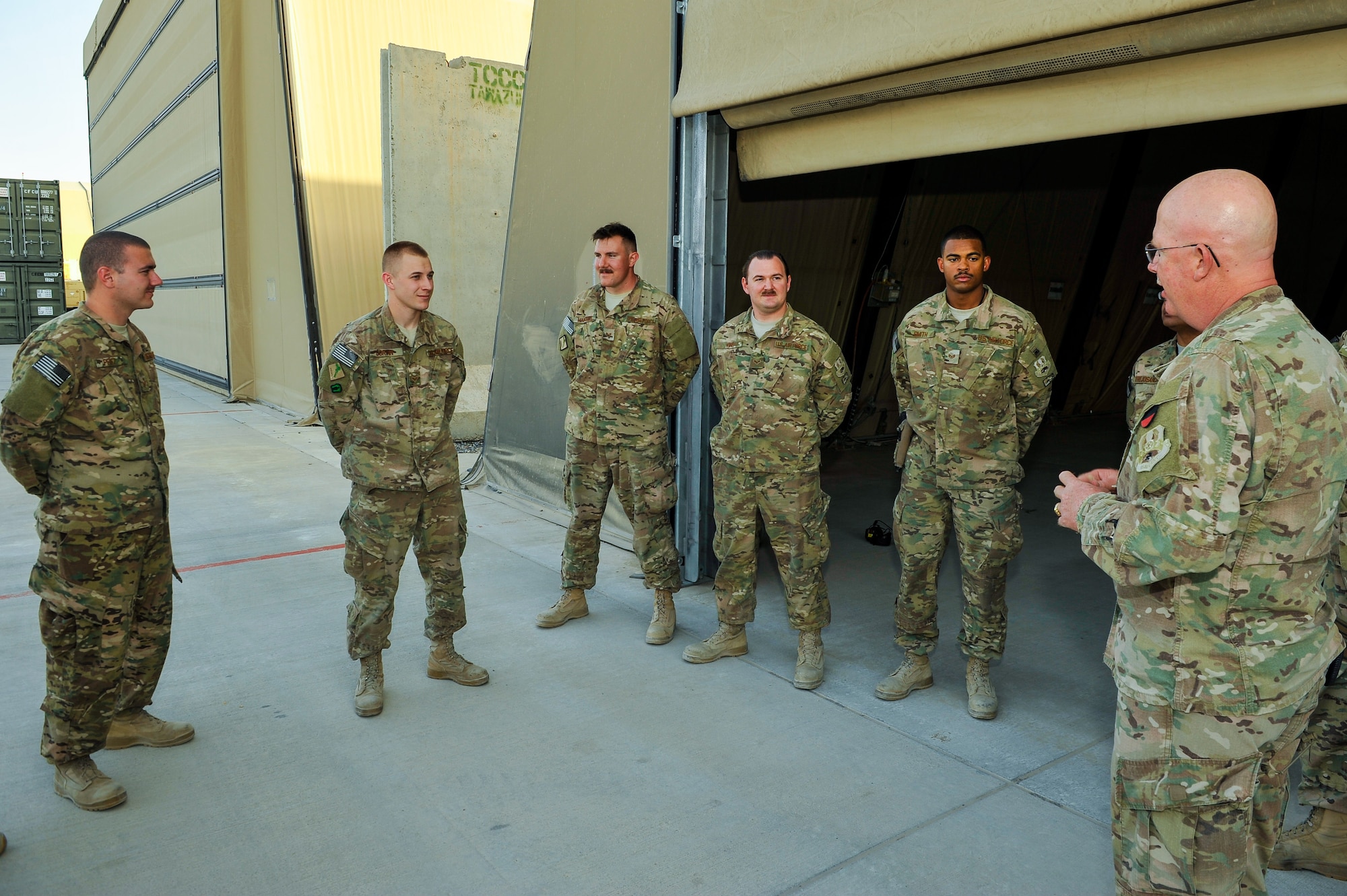U.S. Air Force Chief Master Sgt. Jeffery Brown, 455th Air Expeditionary Wing command chief, talks with Airmen assigned to the 451st Air Expeditionary Group during a visit to Kandahar Airfield, Afghanistan, May 2, 2015.  The chief along with Brig. Gen. Mark D. Kelly, 455th AEW commander, met with Airmen from across the group who provide intelligence, surveillance and reconnaissance, command and control, personnel recovery, and airborne datalink capabilities to commanders in the Afghanistan theater of operations. (U.S. Air Force photo by Maj. Tony Wickman/Released)    