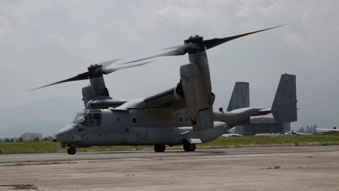 U.S. Marine MV-22 Osprey with Joint Task Force 505 departs for a search and rescue mission out of the Tribhuvan International Airport, Kathmandu, Nepal May 13. The Osprey, which is assigned to Marine Medium Tiltrotor Squadron 262, carries JTF personnel in search of a UH-1Y Huey helicopter carrying six Marines and two Nepalese soldiers. The Huey, assigned to Marine Light Attack Helicopter Squadron 469, went missing while conducting humanitarian assistance after a 7.3 magnitude earthquake May 12. (U.S. Marine Corps photo by Cpl. Thor Larson)