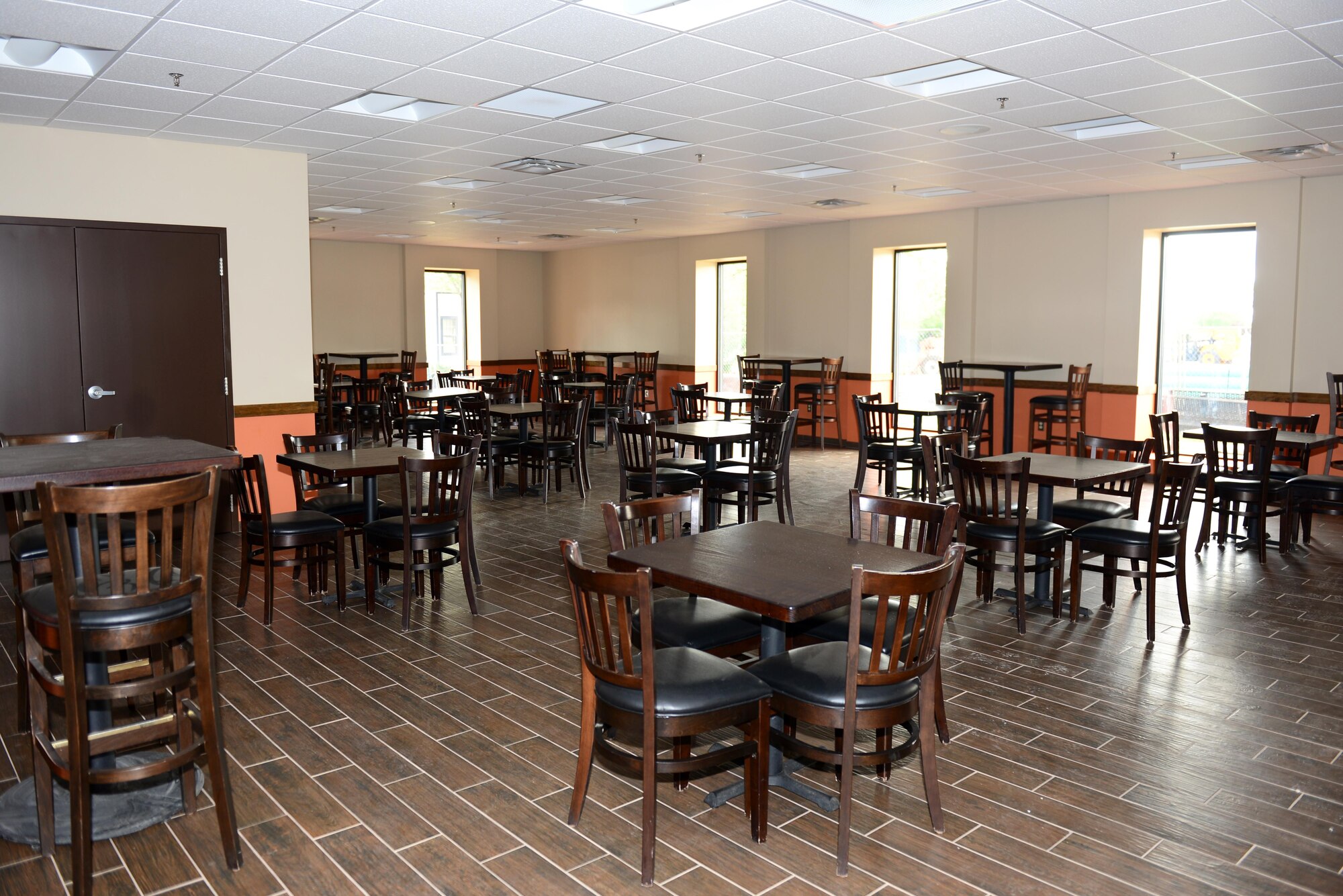The café at the Community Commons is ready for customers Jun 4, 2015 at Cannon Air Force Base, N.M. Terese Harris, 27th Special Operations Force Support Squadron deputy commander, stated that the café will feature a new menu and tabletop service after its slated re-opening June 4. (U.S. Air Force photo/Airman 1st Class Shelby Kay-Fantozzi)
