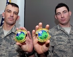 Staff Sgt. Andrew Dunn and Airman 1st Class Brian Alfano were the first Reserve and Air National Guard Airmen to graduate from the 22nd Training Squadron’s survival, evasion, resistance and escape course at Fairchild Air Force Base, Wash. They graduated Dec. 2, 2010. This course was specially tailored so Guard and Reserve SERE specialists could receive training comparable to their active duty counterparts. Airman Dunn is from the Air Force Reserve Command’s 514th Air Mobility Wing at Joint Base McGuire-Dix-Lakehurst, N.J., and Airman Alfano is from the New York Air National Guard’s 106th Rescue Wing at Gabreski Airport in Westhampton Beach, N.Y.