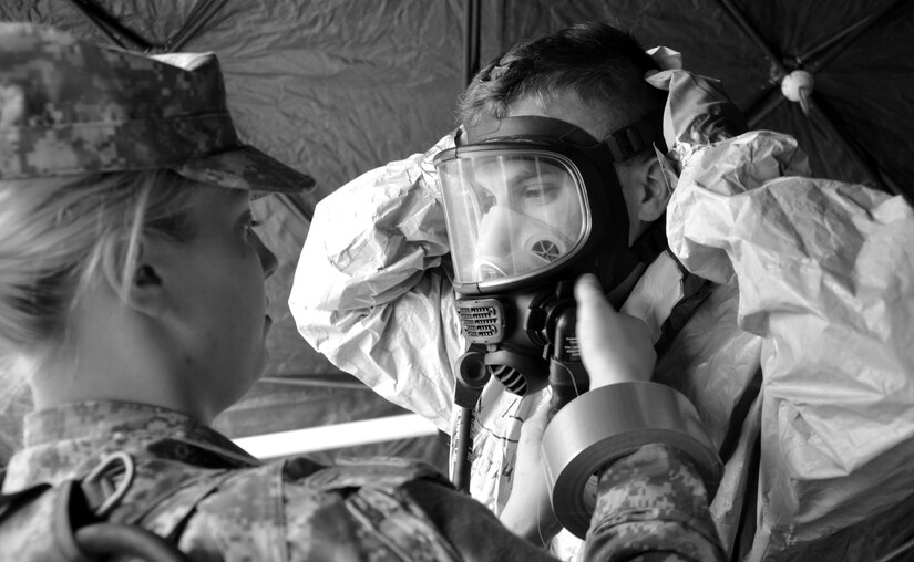 The 388th Chemical Biological Radiological Nuclear Company show no signs of complacency during a Mass Casualty Decontamination training event during Battle Assembly at Fort McCoy and Volk Field, Wis., May 8-10. CBRN Soldiers responded to a training scenario incident, coordinate with local and federal officials, contain the situation, identify the chemicals or toxins, all while safely evacuating and treating the effected population. The 388th CBRN Company, headquartered in Junction city, Wis., is in the second phase of a multi-year mission to support the Department of Homeland Security. Army North instructors continue to provide  388th Soldiers with hands on training, equipment, and experience to assist military and civil authorities in the event of a natural disaster, chemical emergency, or terrorist attack within the United States.