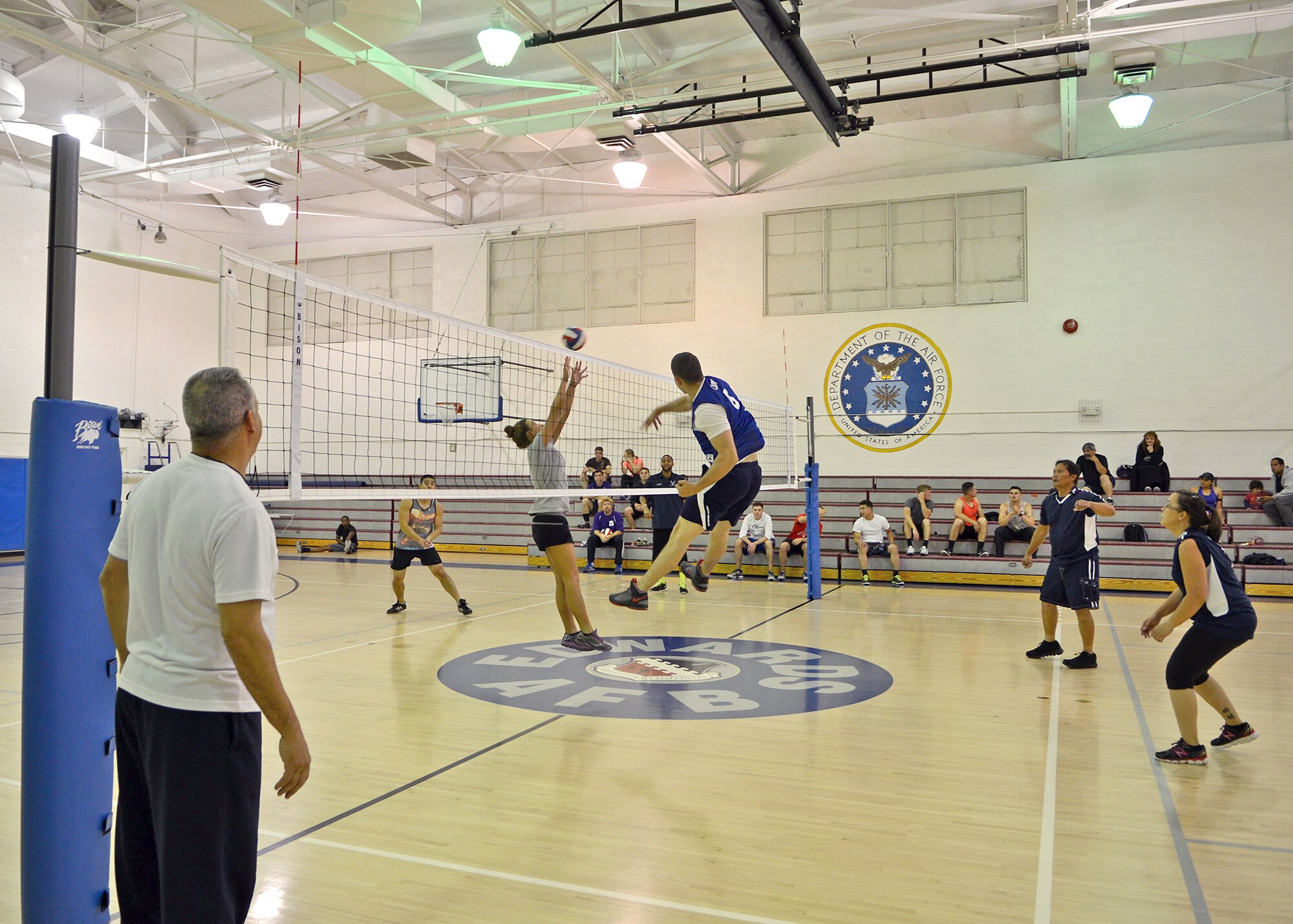 The Rosburg Fitness Center was the site of this year’s 3-on-3 All Star Intramural Volleyball tournament where approximately 10 teams battled for bragging rights and a first-place trophy May 7. The tournament was single-elimination and after a constant back and forth game, the combined 412th Test Engineering Group and 419th Flight Test Squadron team ended up beating the 412th Operations Support Squadron team with a score of 18-16 to claim the All Star title. (U.S. Air Force photo by Jet Fabara)