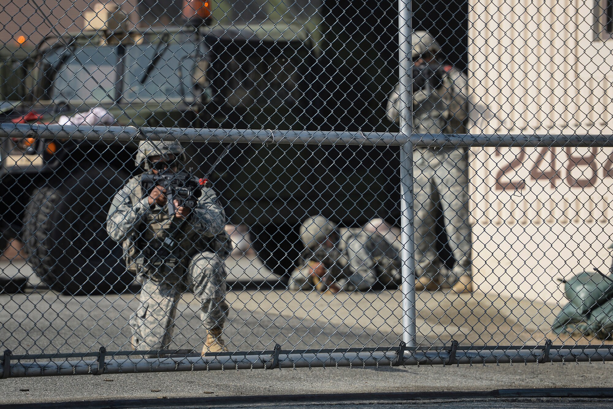 Army Soldiers defend Delta Battery from a simulated opposition forces attack during Operation Readiness Exercise Beverly Midnight 15-2 May 12, 2015 at Osan Air Base, Republic of Korea. The exercise helps identify areas in which procedures should be changed or equipment added in order to enhance the emergency response capabilities.(U.S. Air Force photo by Senior Airman Matthew Lancaster)