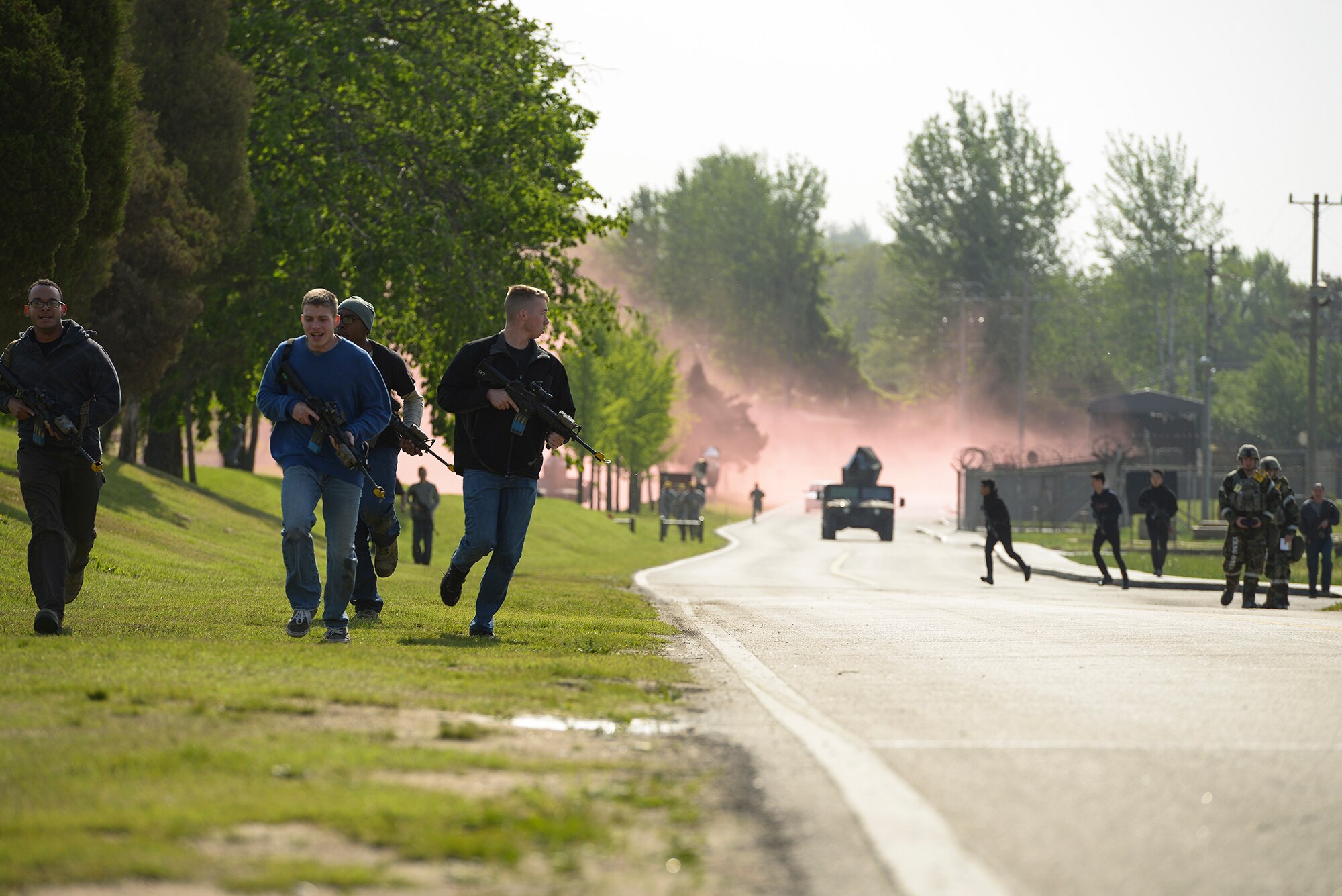 United States and Republic of Korea personnel playing opposition forces engage Army forces during an inject in operational readiness exercise Beverly Midnight 15-02 May 13, 2015, at Osan Air Base, Republic of Korea. (U.S. Air Force photo by Staff Sgt. Jake Barreiro)