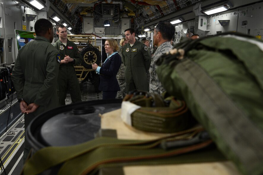 Miranda Ballentine, assistant secretary of the Air Force for installations, environment, and energy, is briefed about C-17 Globemaster III air drop mission performed by Airmen of the 62nd Airlift Wing May 11, 2015, at Joint Base Lewis-McChord, Wash. The C-17 is capable of rapid strategic delivery of troops and all types of cargo to main operating bases or directly to forward bases in the deployment area (U.S. Air Force photo\ Staff Sgt. Tim Chacon)